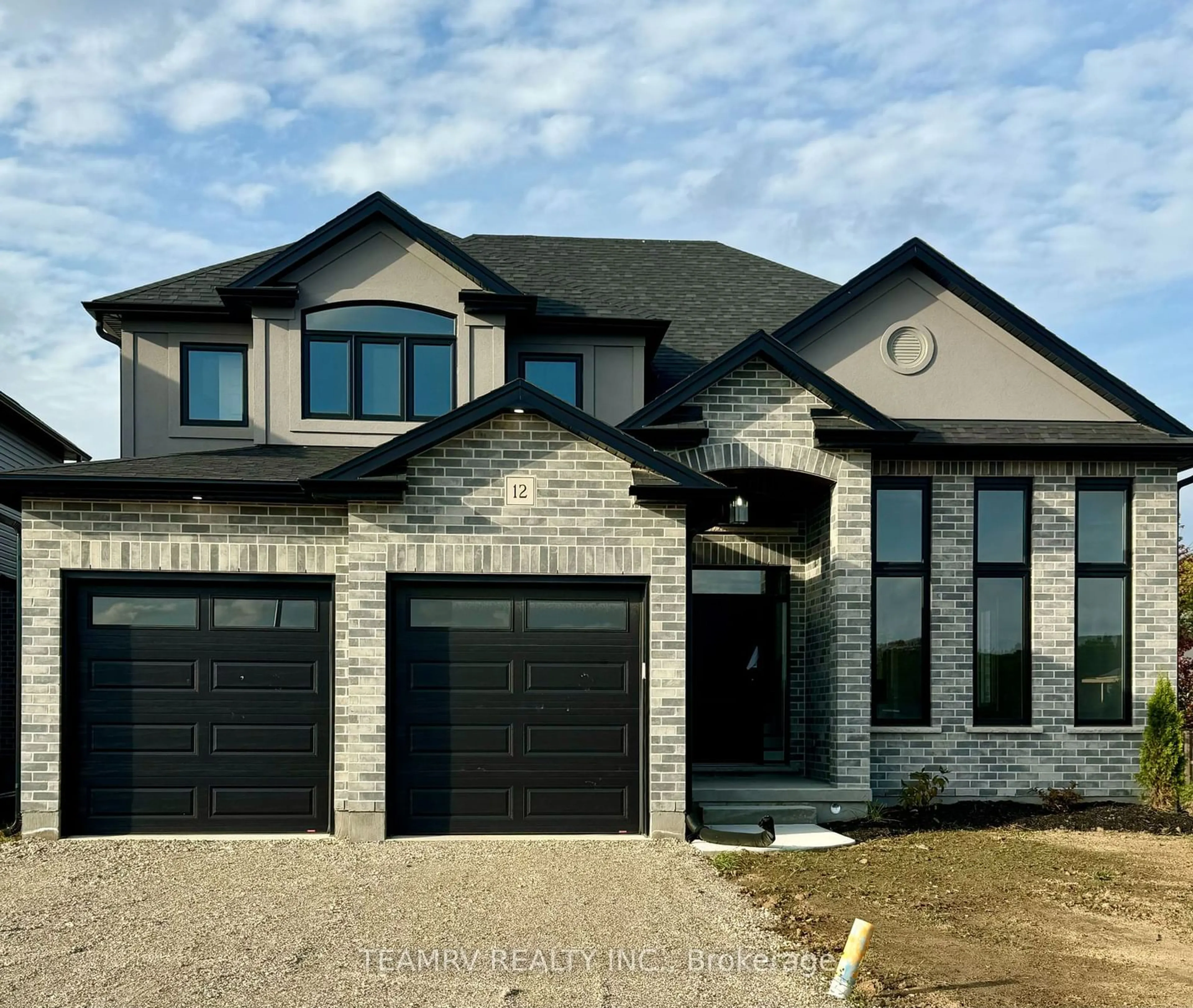 Home with brick exterior material for 12 Sycamore Dr, Tillsonburg Ontario N4G 5S3