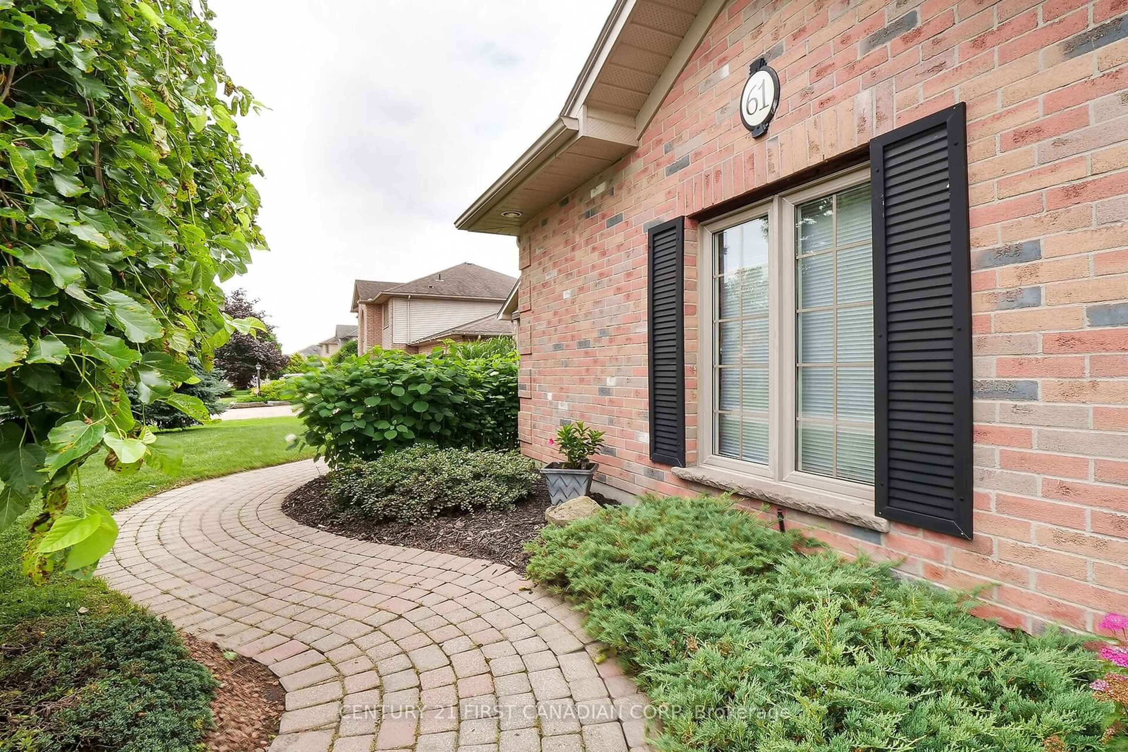 Home with brick exterior material for 61 South Carriage Rd, London Ontario N6H 5M3