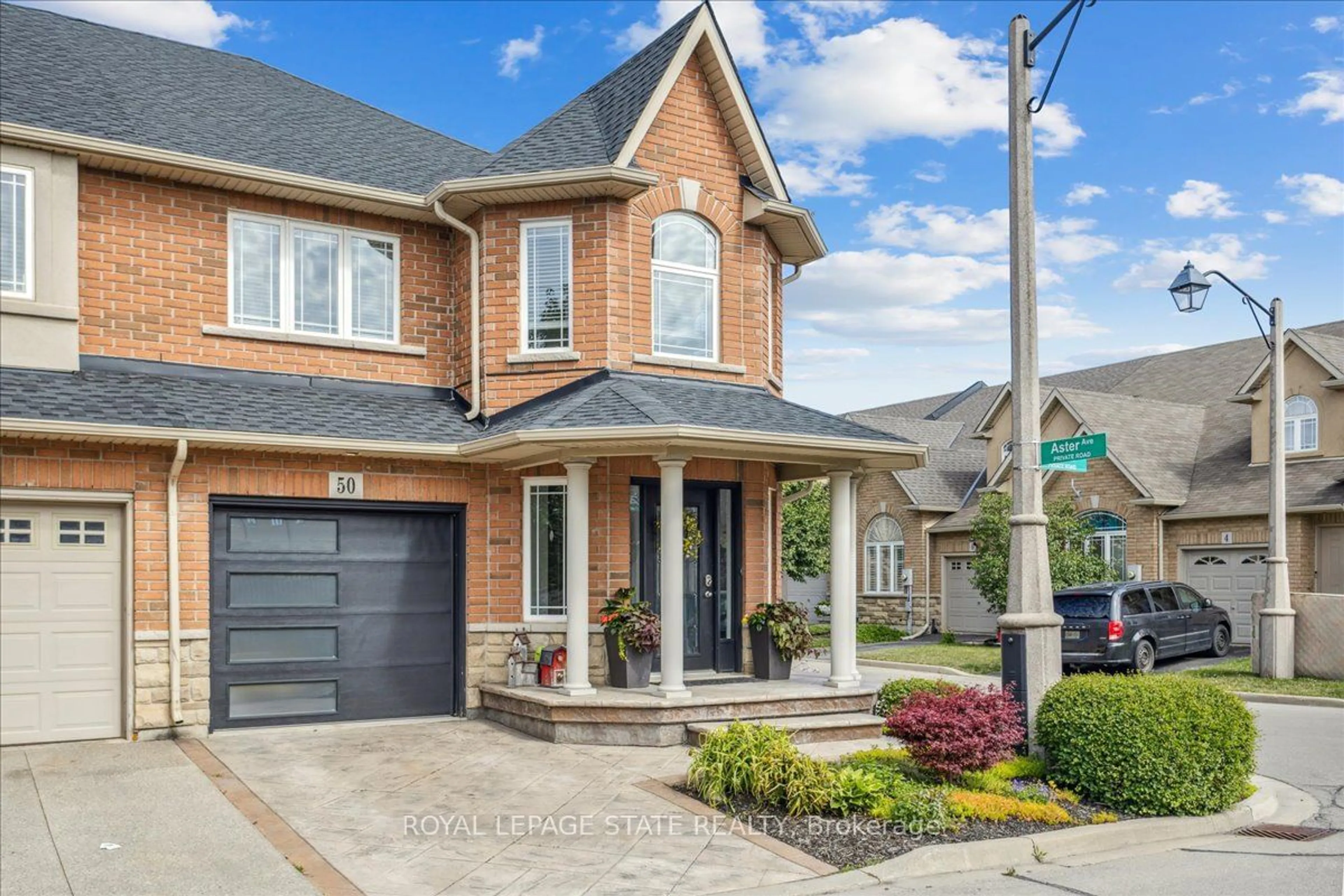 Home with brick exterior material for 50 Geranium Ave, Hamilton Ontario L0R 1P0