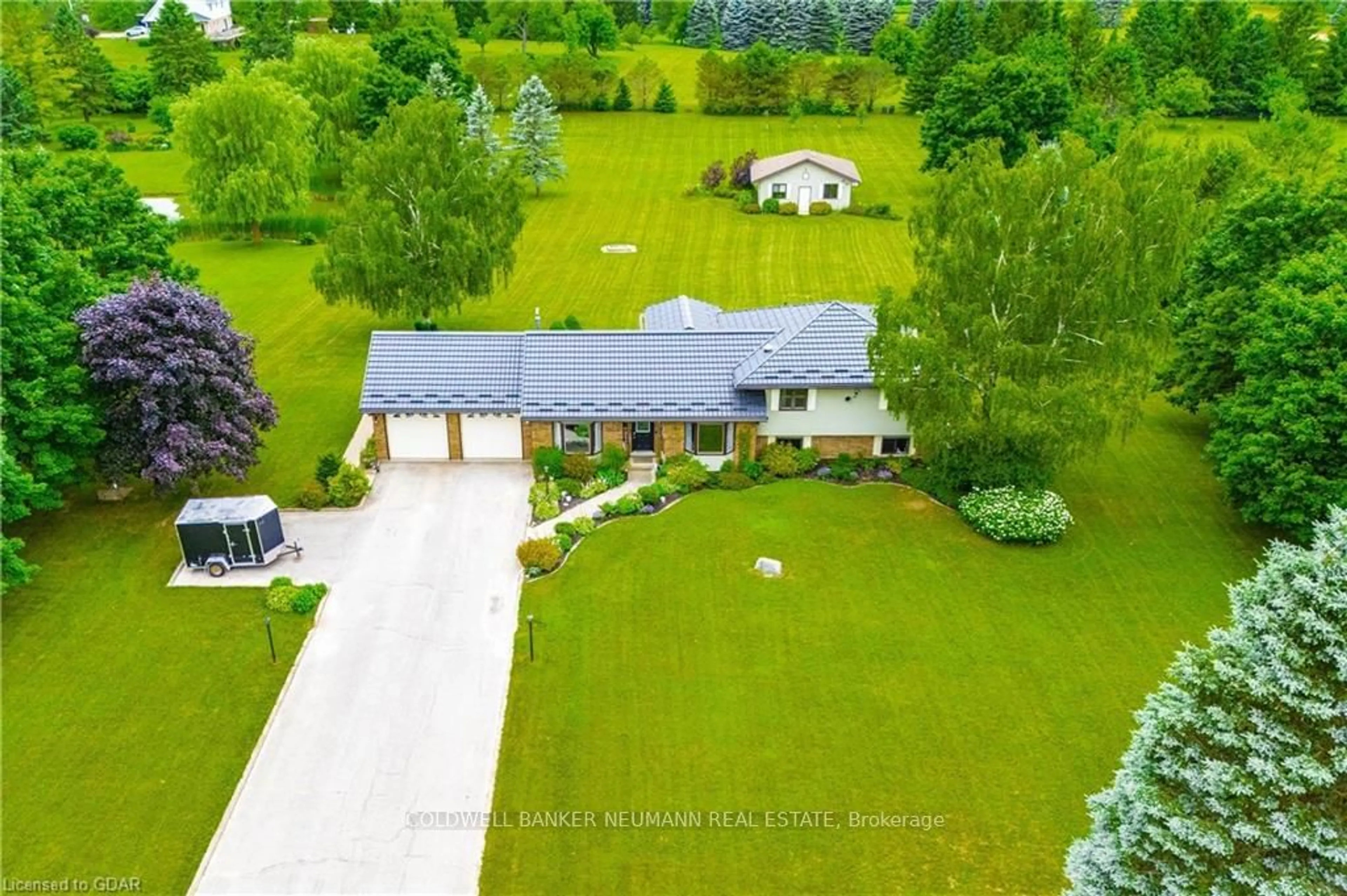 Frontside or backside of a home, cottage for 9410 Sally St, Wellington North Ontario N0G 2L0