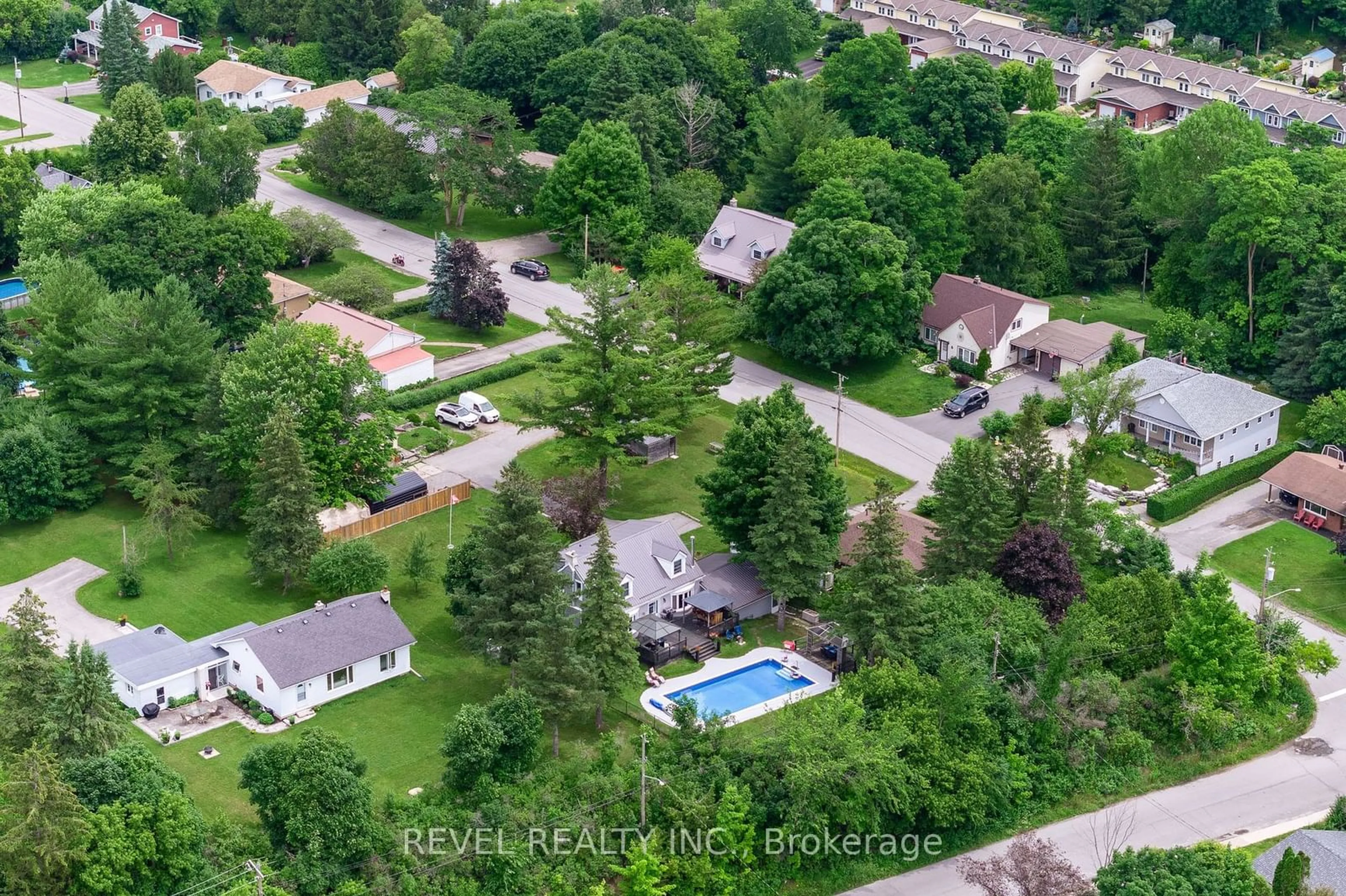 Frontside or backside of a home, the fenced backyard for 77 Bond St, Kawartha Lakes Ontario K0M 1N0