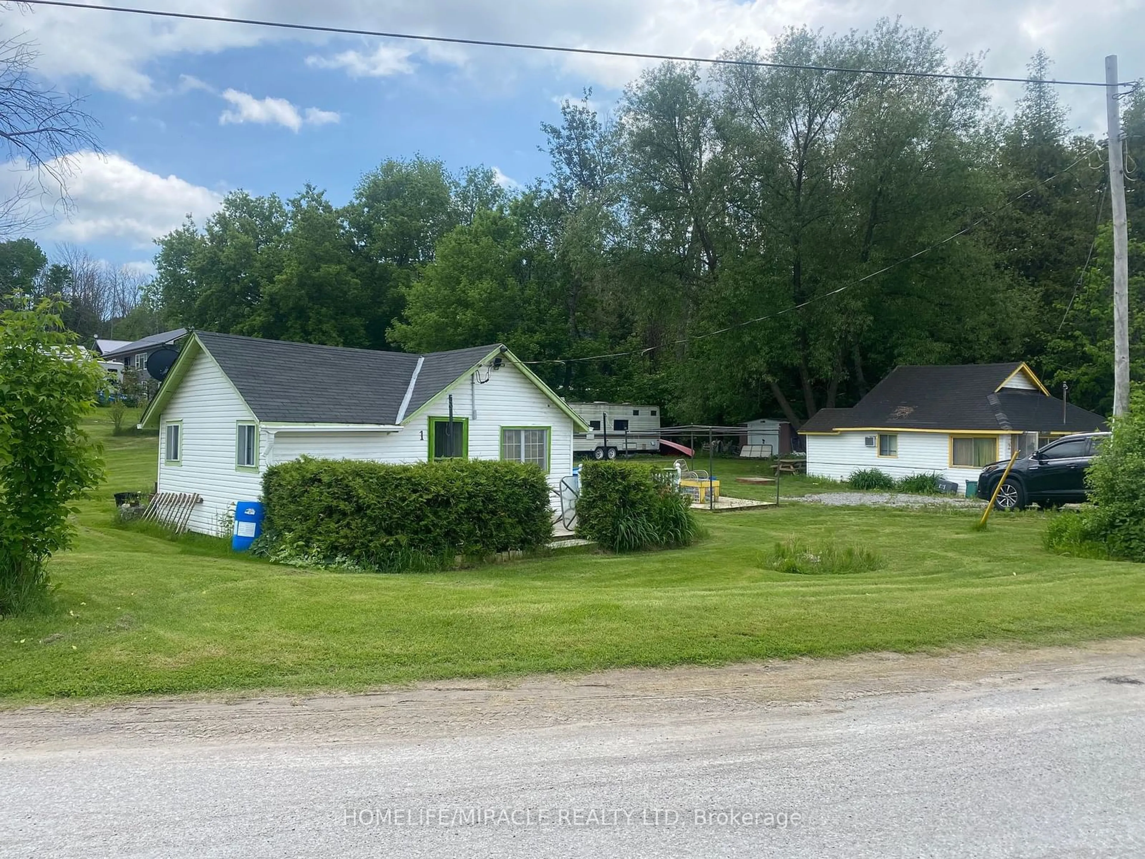 A pic from outside/outdoor area/front of a property/back of a property/a pic from drone, street for 211 Dunnette Landing Rd #1 & 2, Alnwick/Haldimand Ontario K0K 2X0