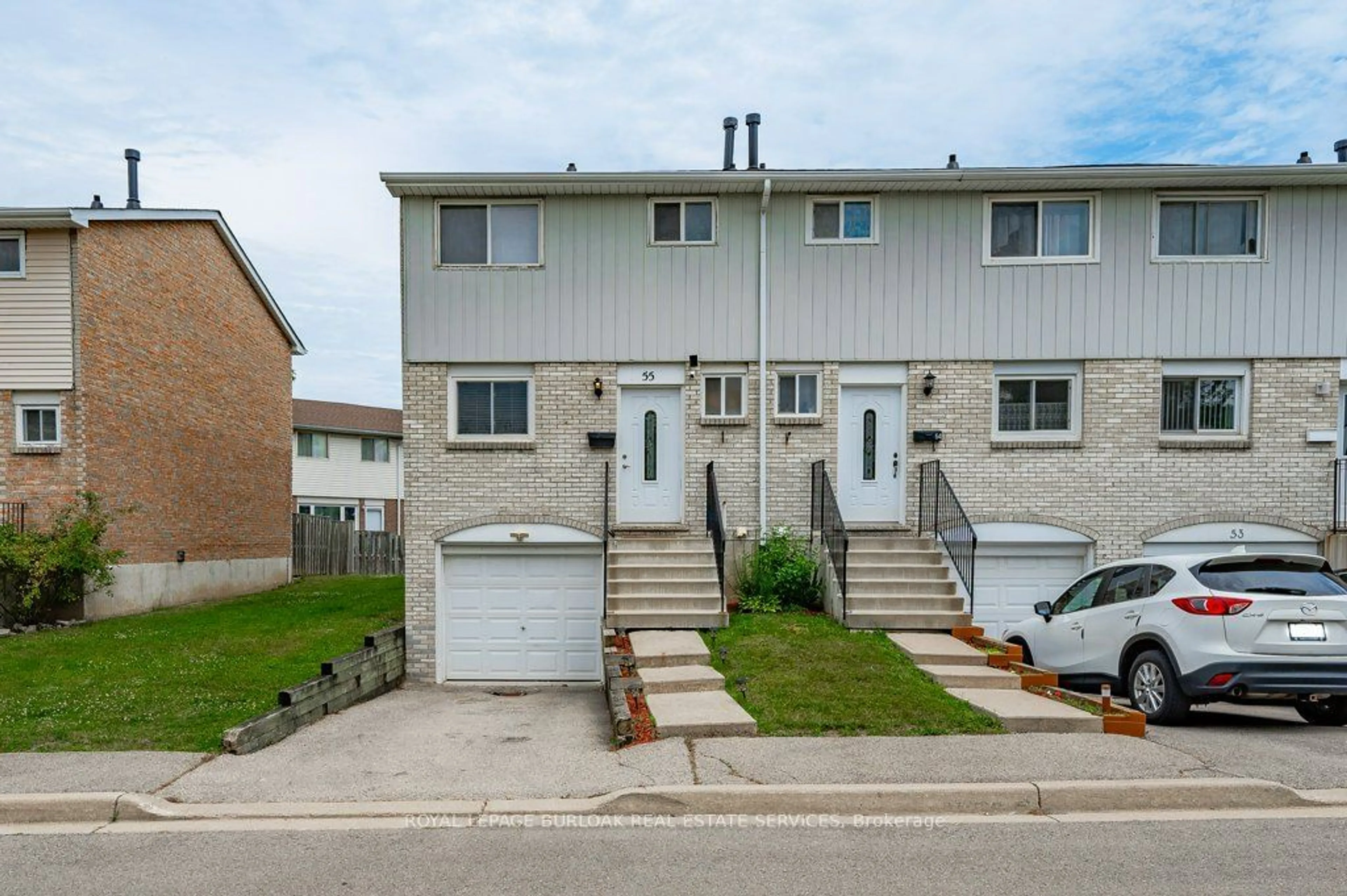 A pic from exterior of the house or condo for 120 Quigley Rd #55, Hamilton Ontario L8K 6L4