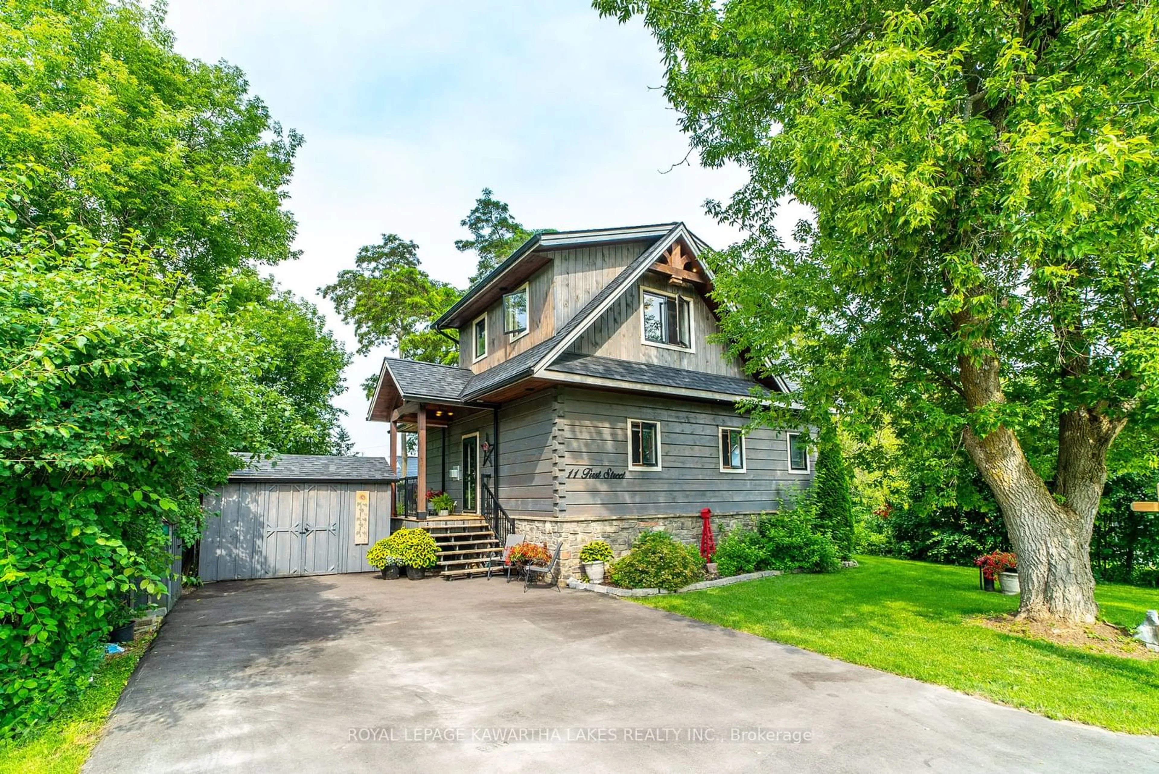 Frontside or backside of a home, cottage for 11 First St, Kawartha Lakes Ontario K0M 1L0