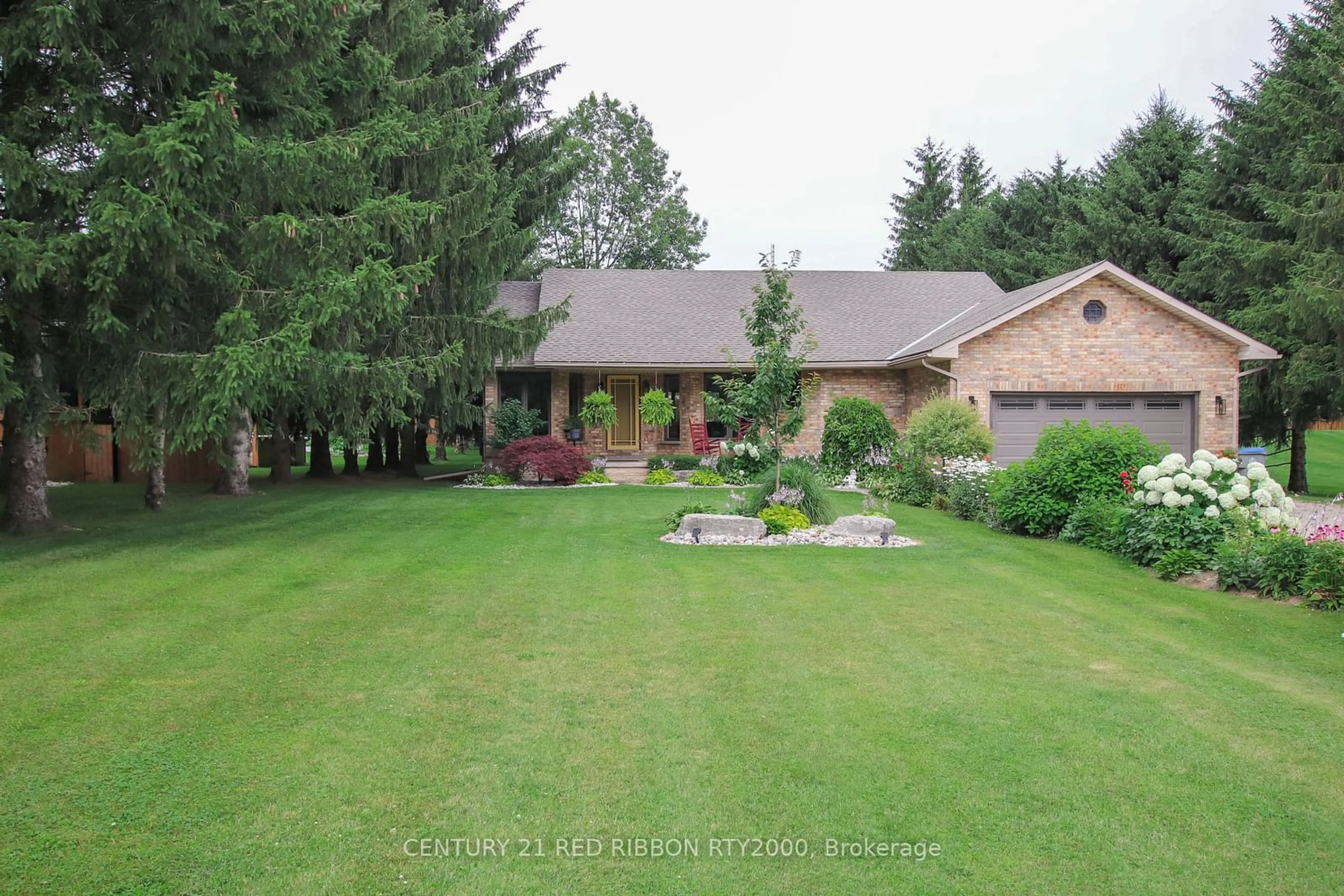 Frontside or backside of a home, the fenced backyard for 24642 Dodge Dr, Adelaide Metcalfe Ontario N7G 3H5