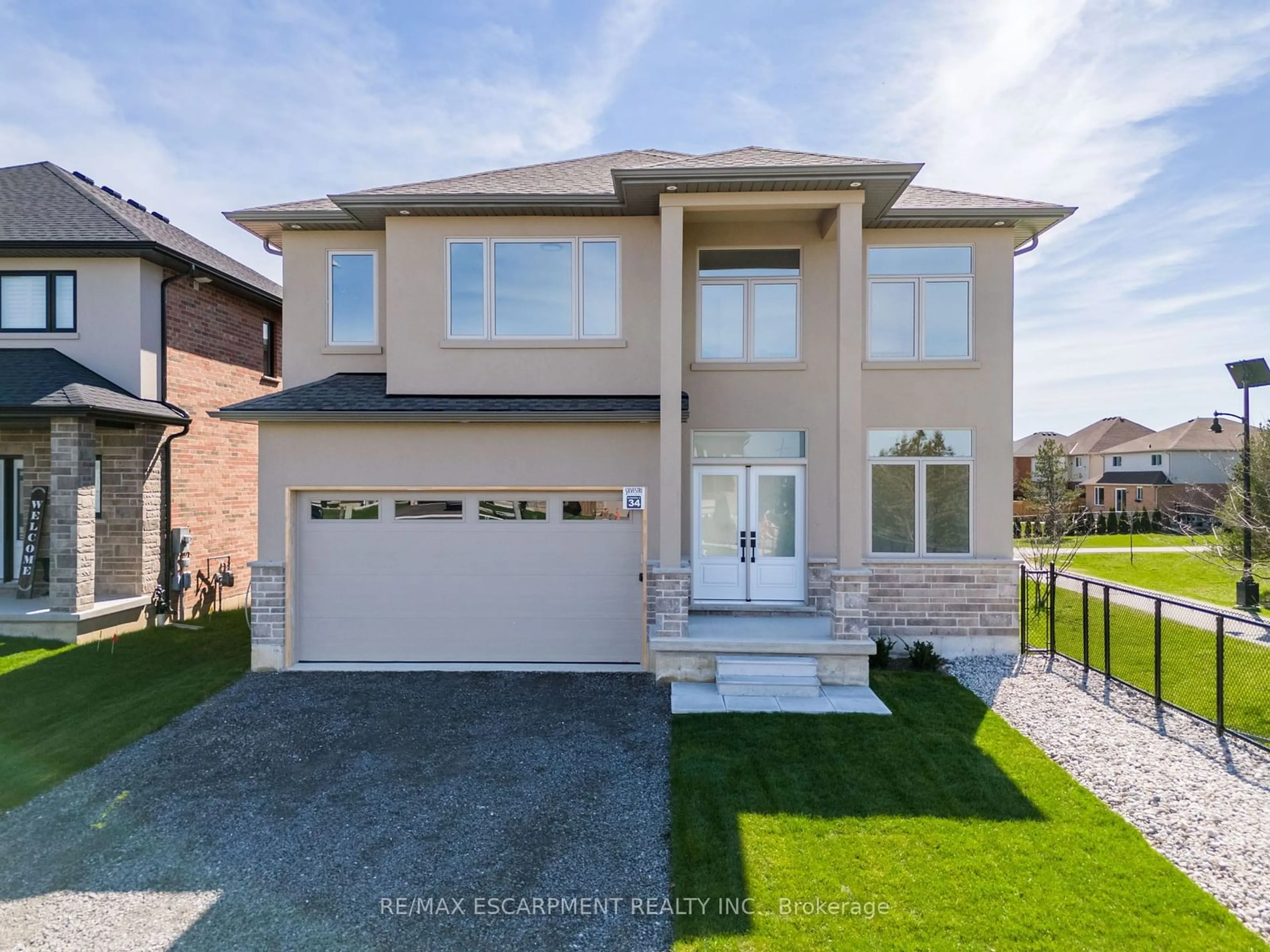 Frontside or backside of a home, the street view for 34 Hampshire Pl, Hamilton Ontario L8J 2V3