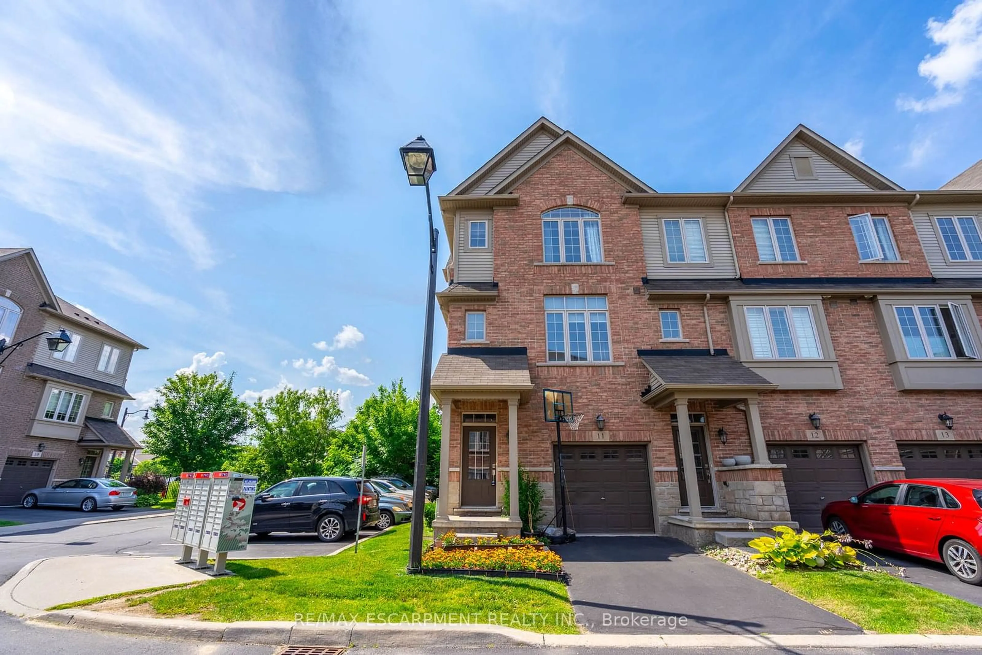 A pic from exterior of the house or condo for 257 Parkside Dr #11, Hamilton Ontario L8B 0W5