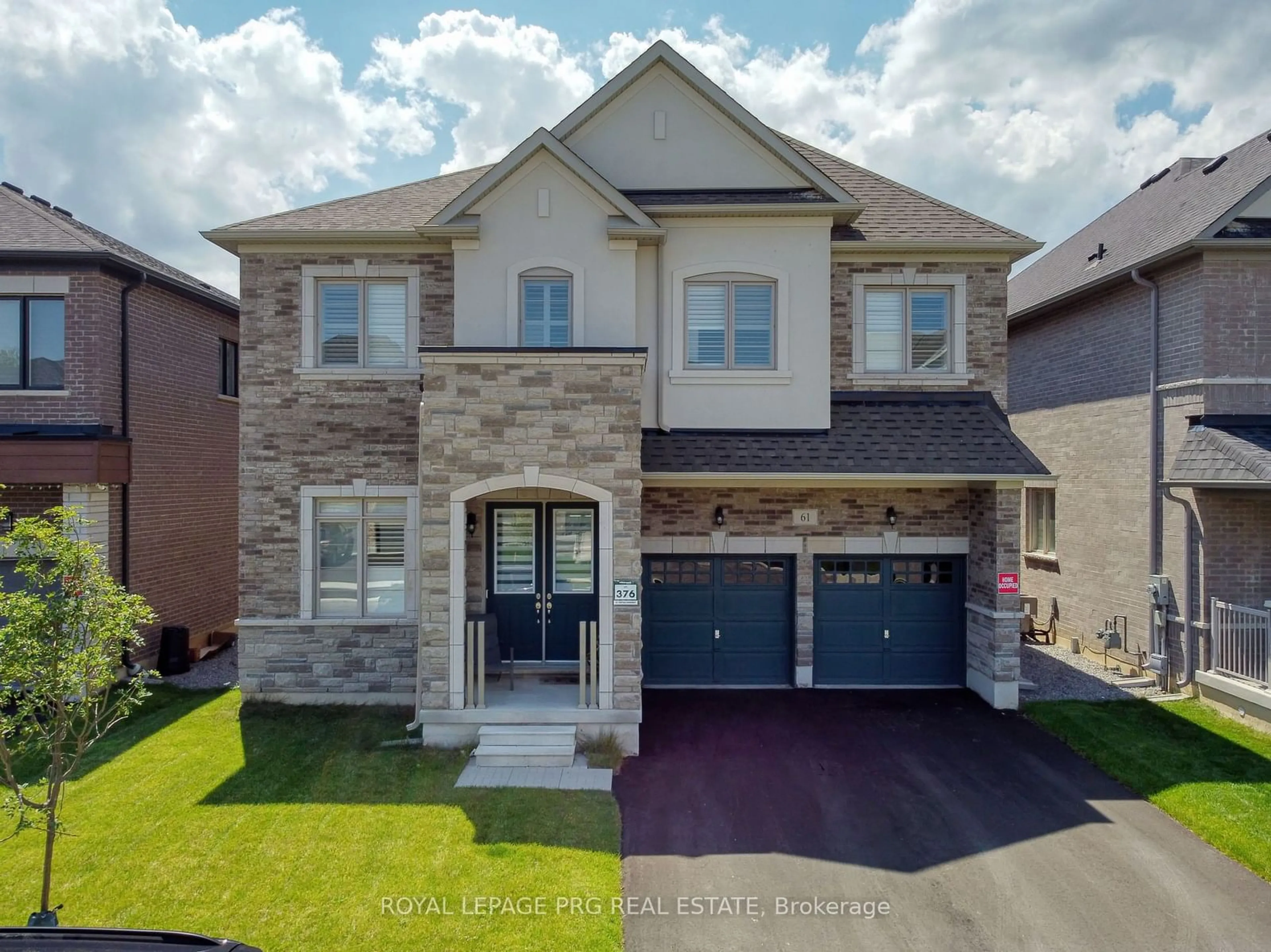 Frontside or backside of a home for 61 Cattail Cres, Hamilton Ontario L0R 1Z6