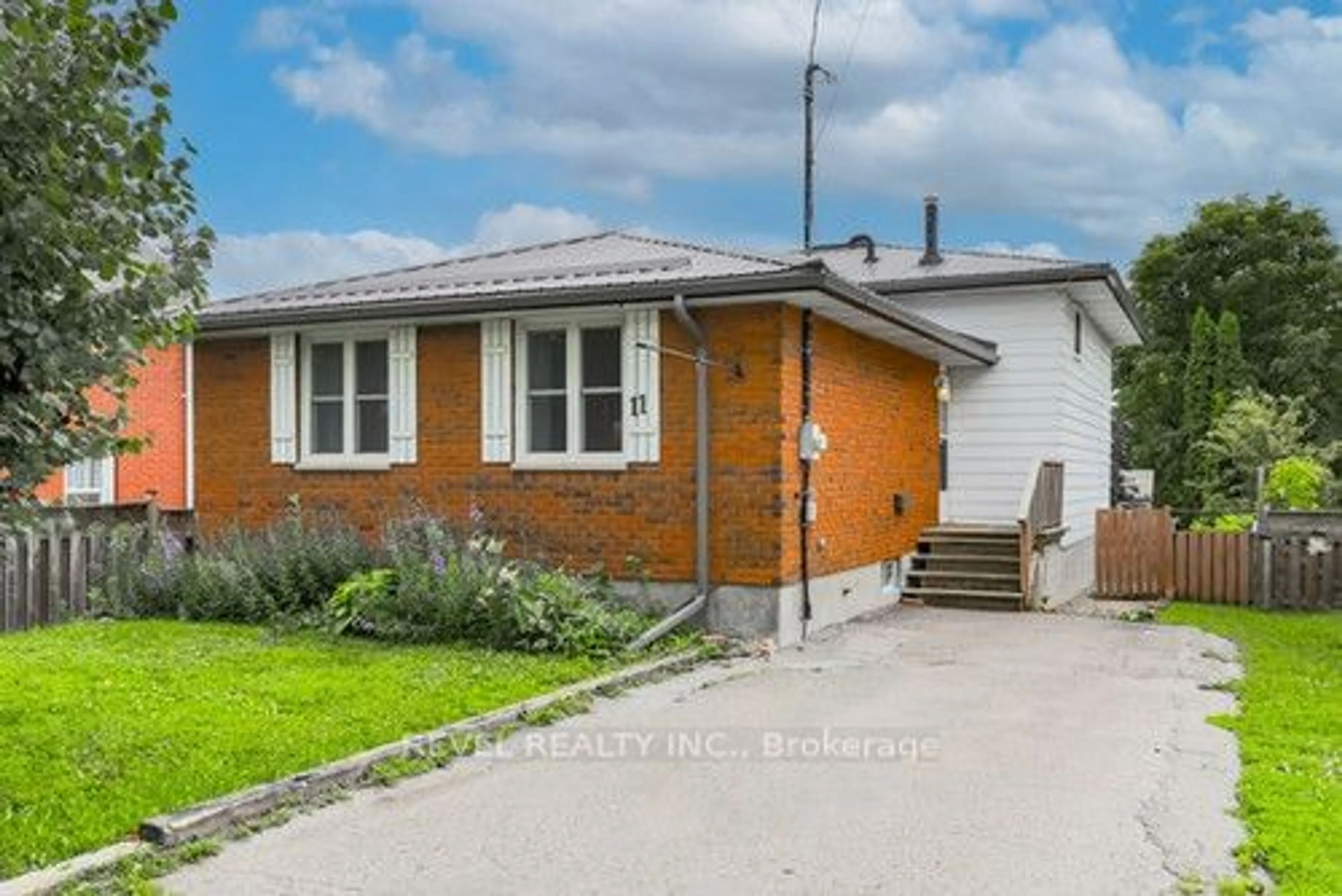 Frontside or backside of a home for 11 Division St, Kawartha Lakes Ontario K9V 1V5