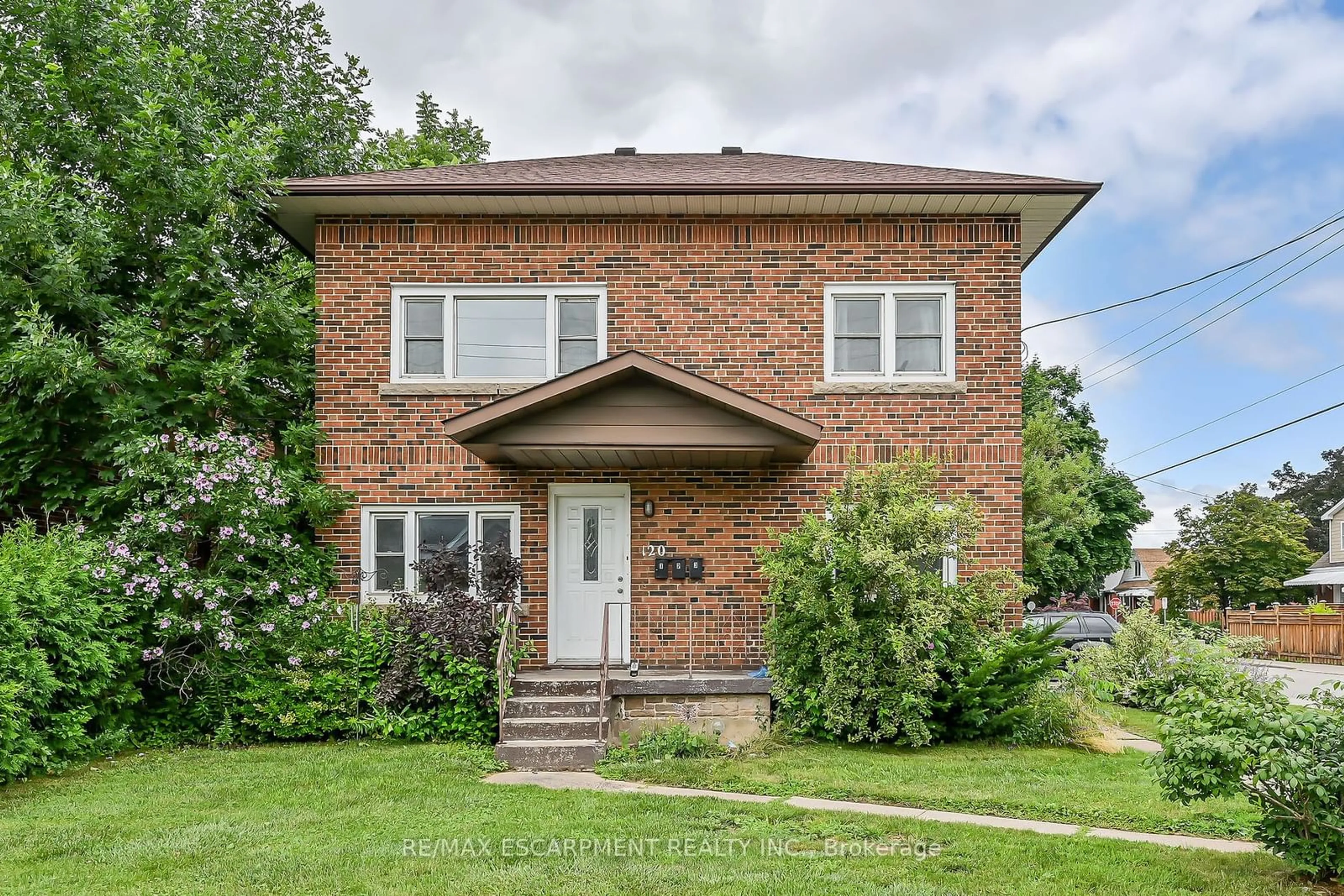 Home with brick exterior material for 120 Cameron Ave, Hamilton Ontario L8K 2X7