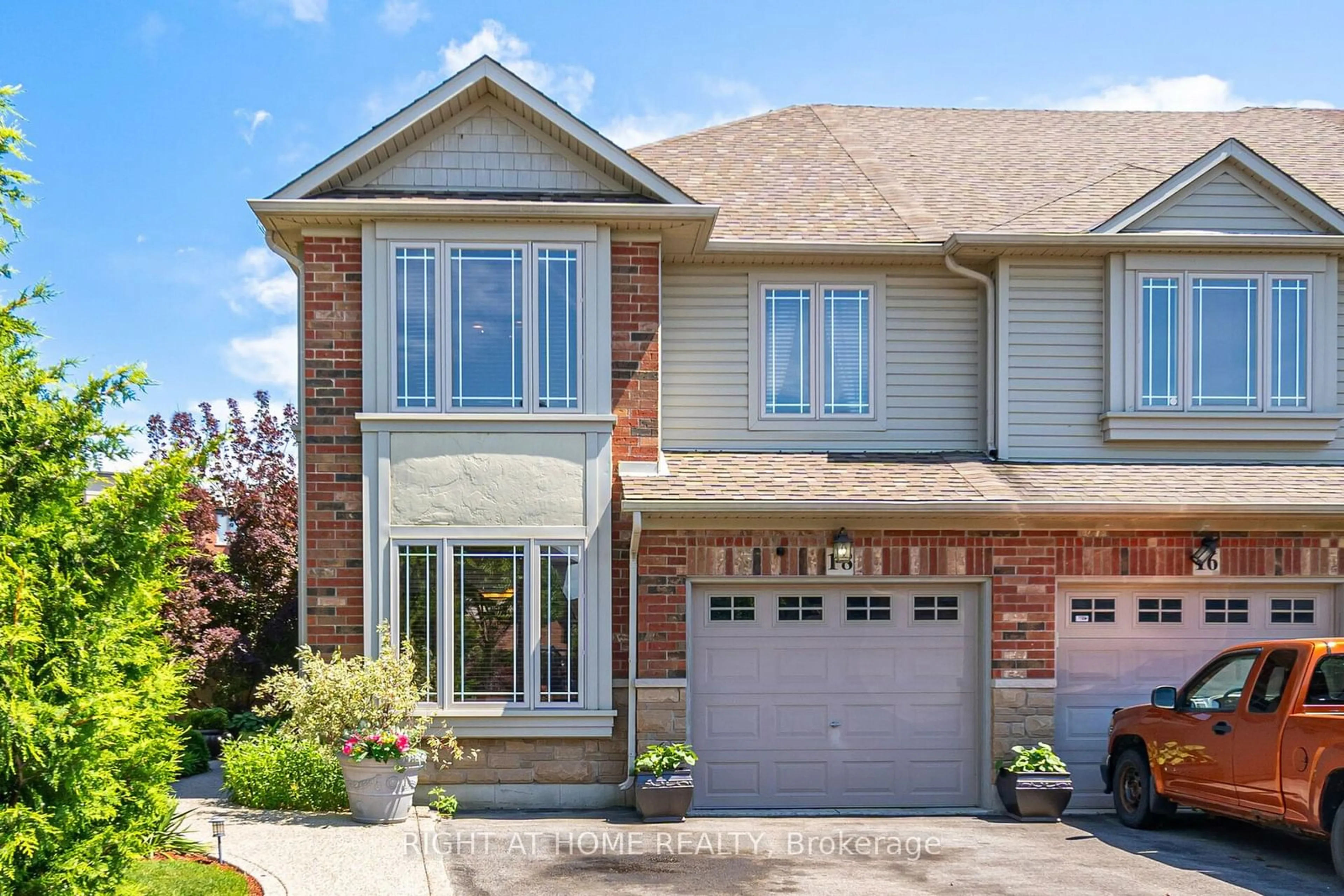 Home with brick exterior material for 18 Magnificent Way, Hamilton Ontario L0R 1C0