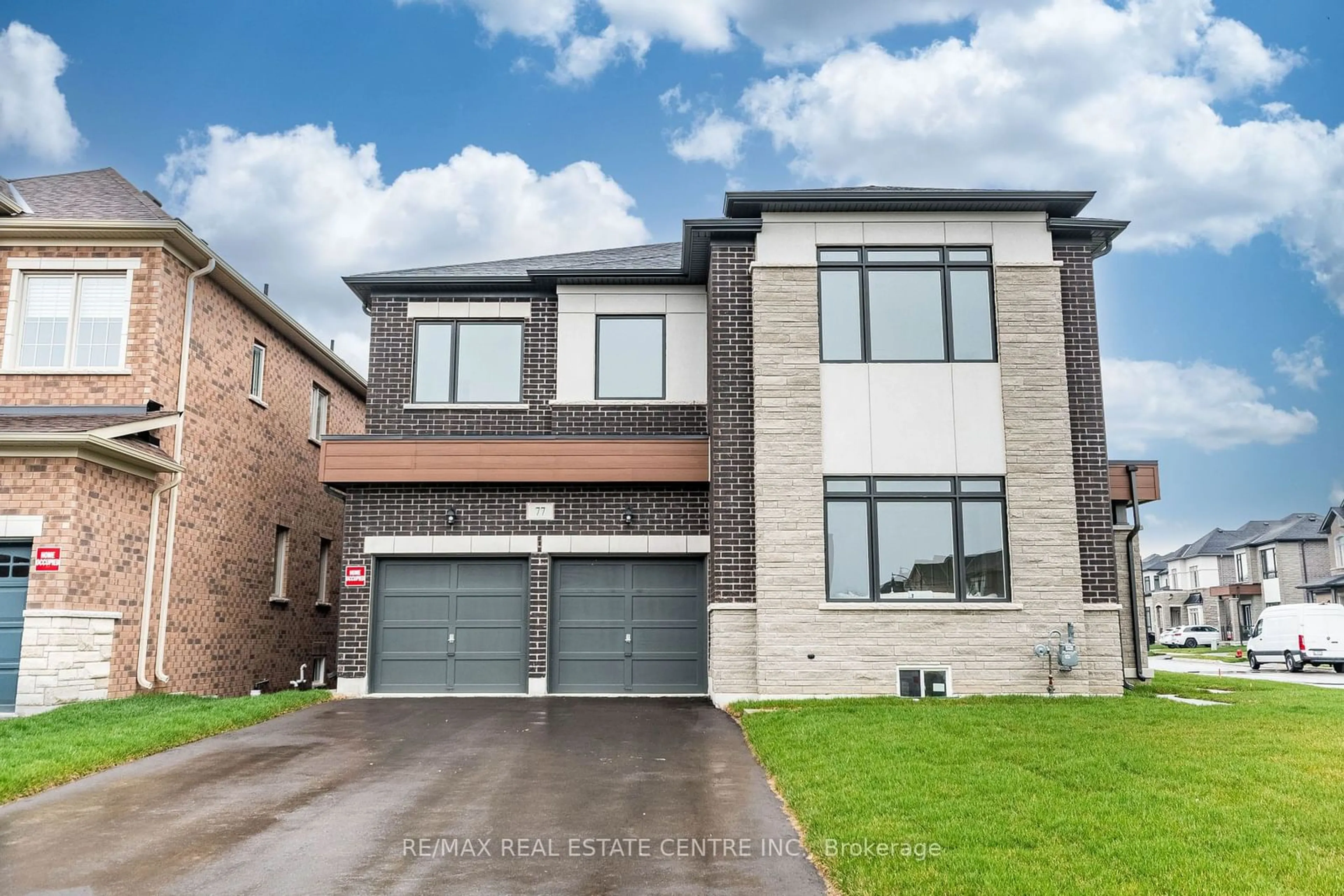 Home with brick exterior material for 77 Pondview Gate, Hamilton Ontario L0R 2H1