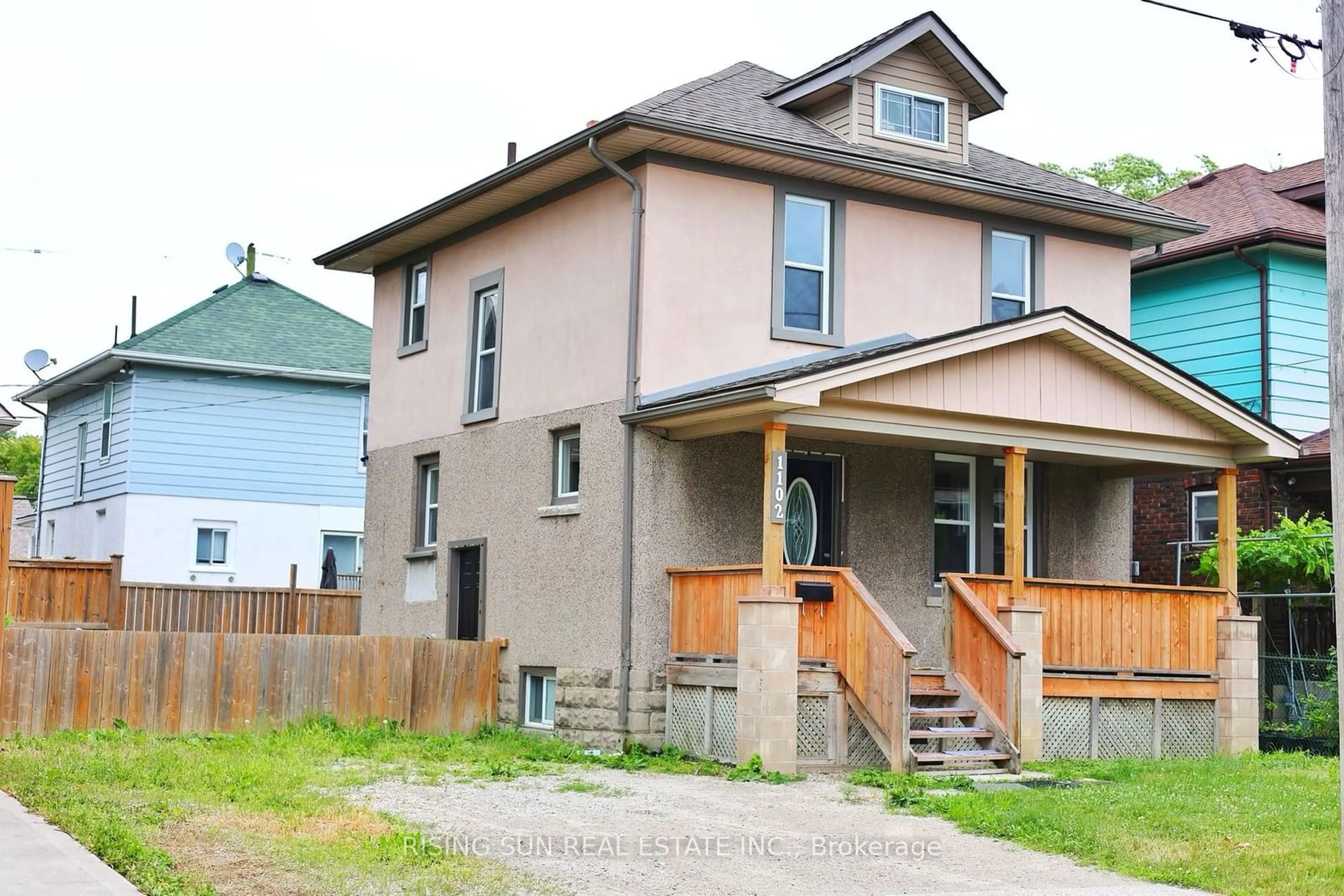 Frontside or backside of a home for 1102 Wellington Ave, Windsor Ontario N9A 5J9