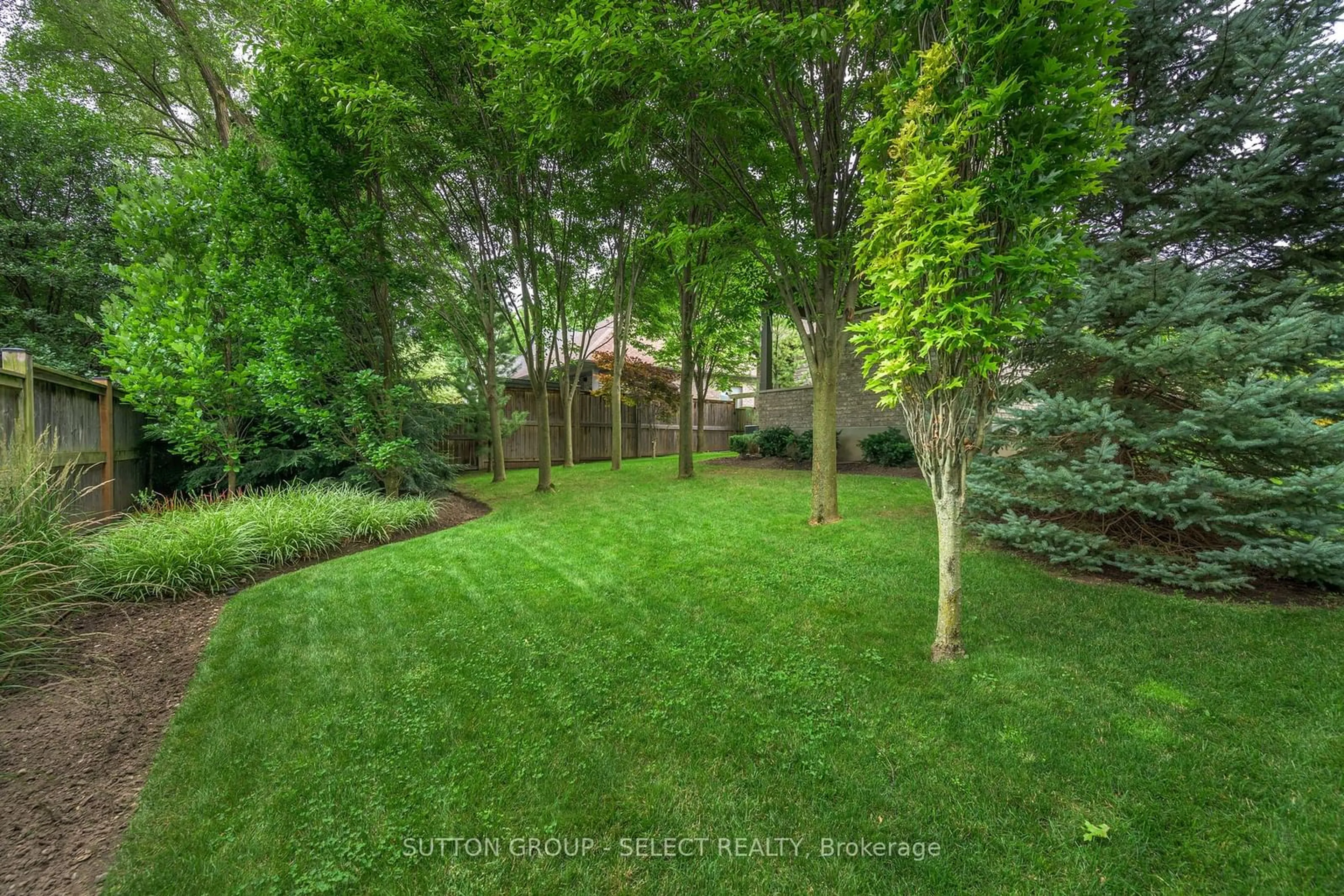 Patio, the fenced backyard for 570 Windermere Rd #1, London Ontario N5X 0K8