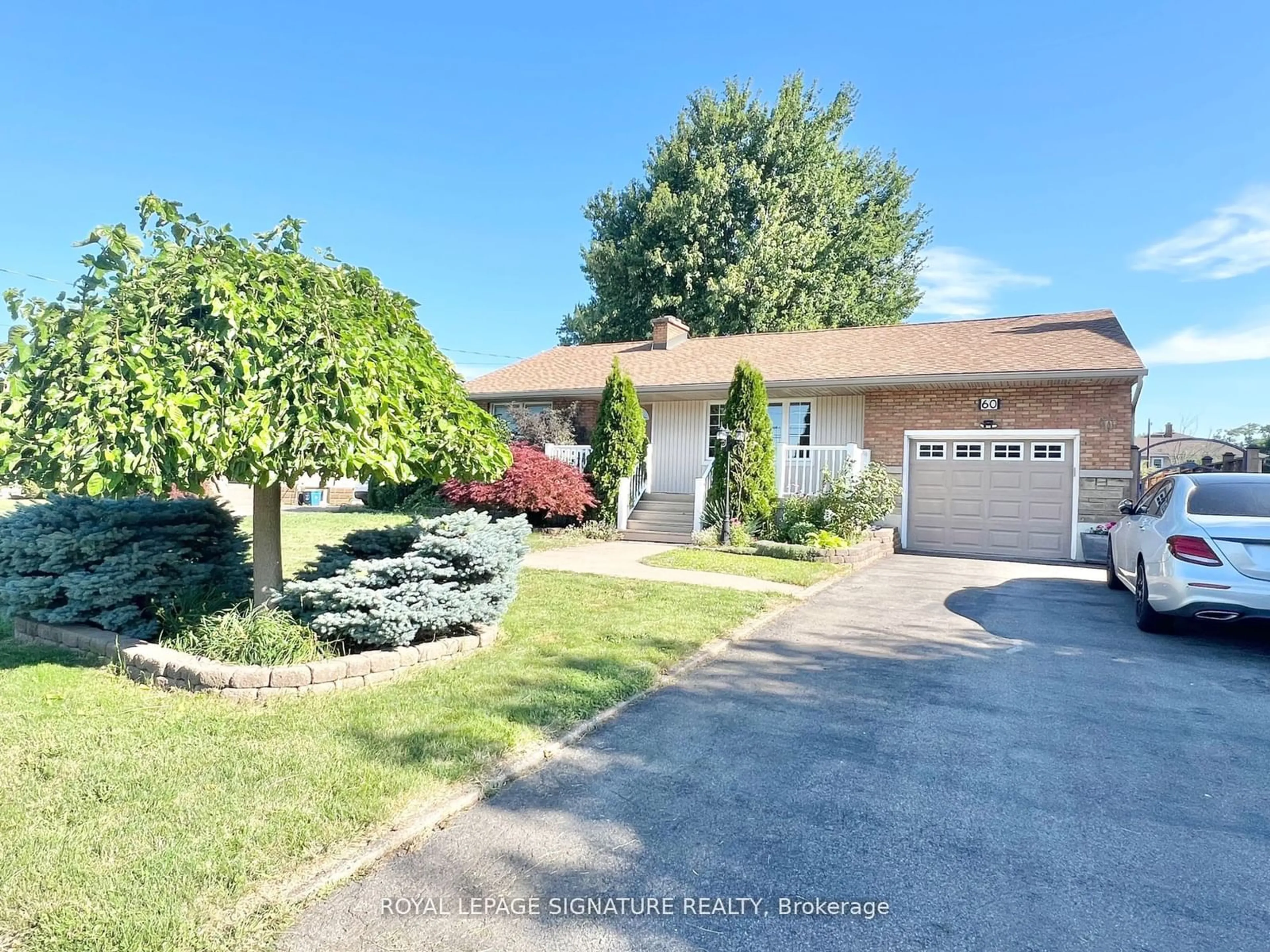 Frontside or backside of a home for 60 Third St, Welland Ontario L3B 4W4