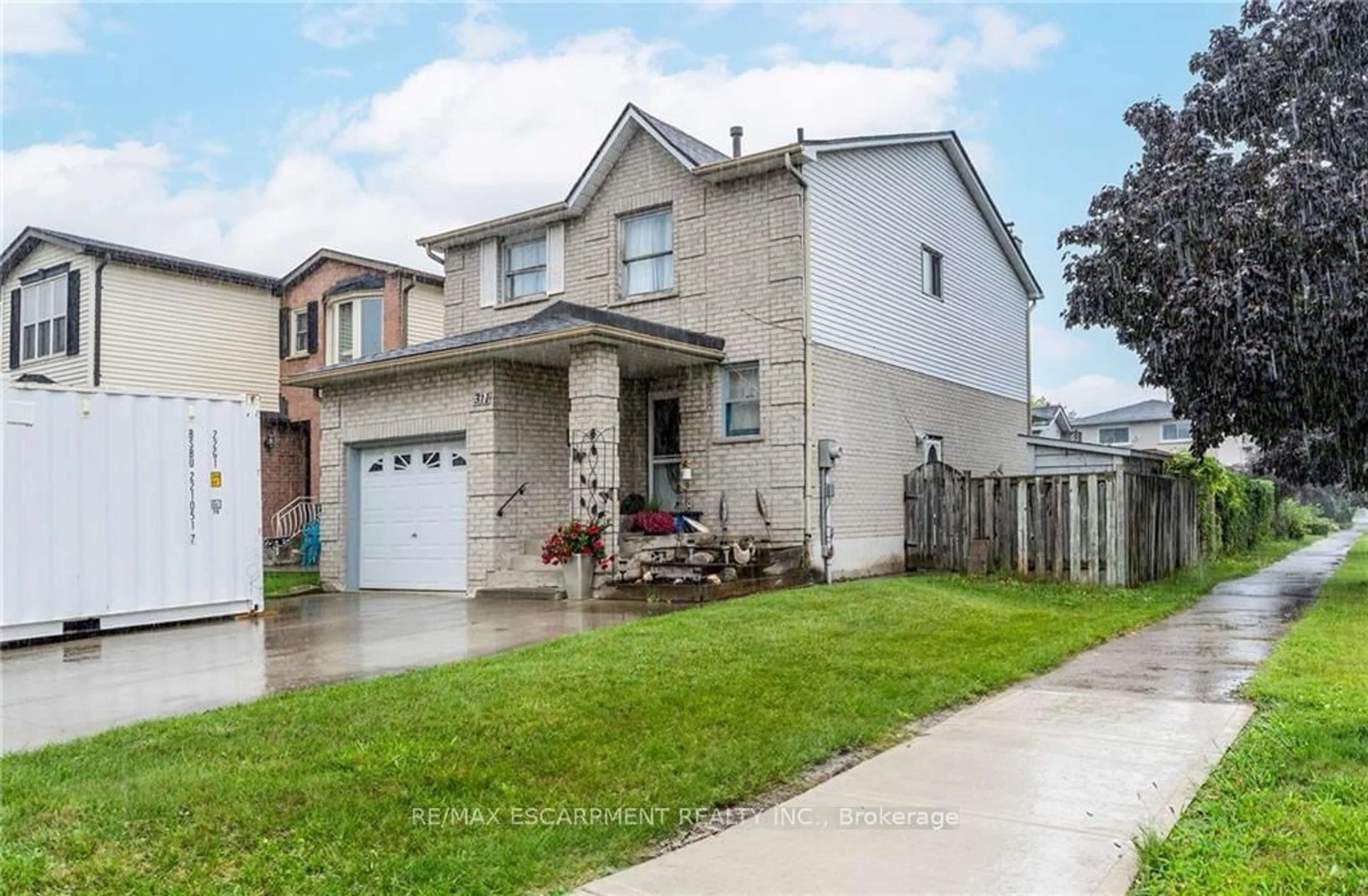 Frontside or backside of a home for 311 Macintosh Dr, Hamilton Ontario L8E 3Z6