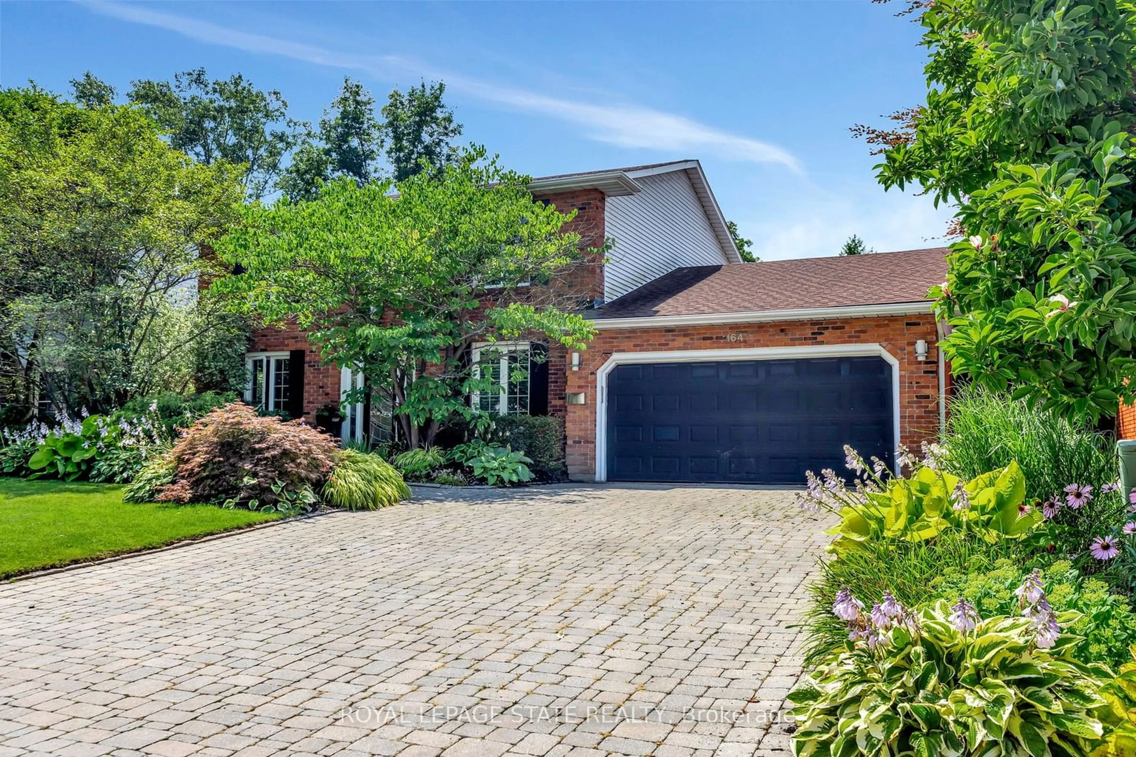 Home with brick exterior material for 164 Hostein Dr, Hamilton Ontario L9G 3W5