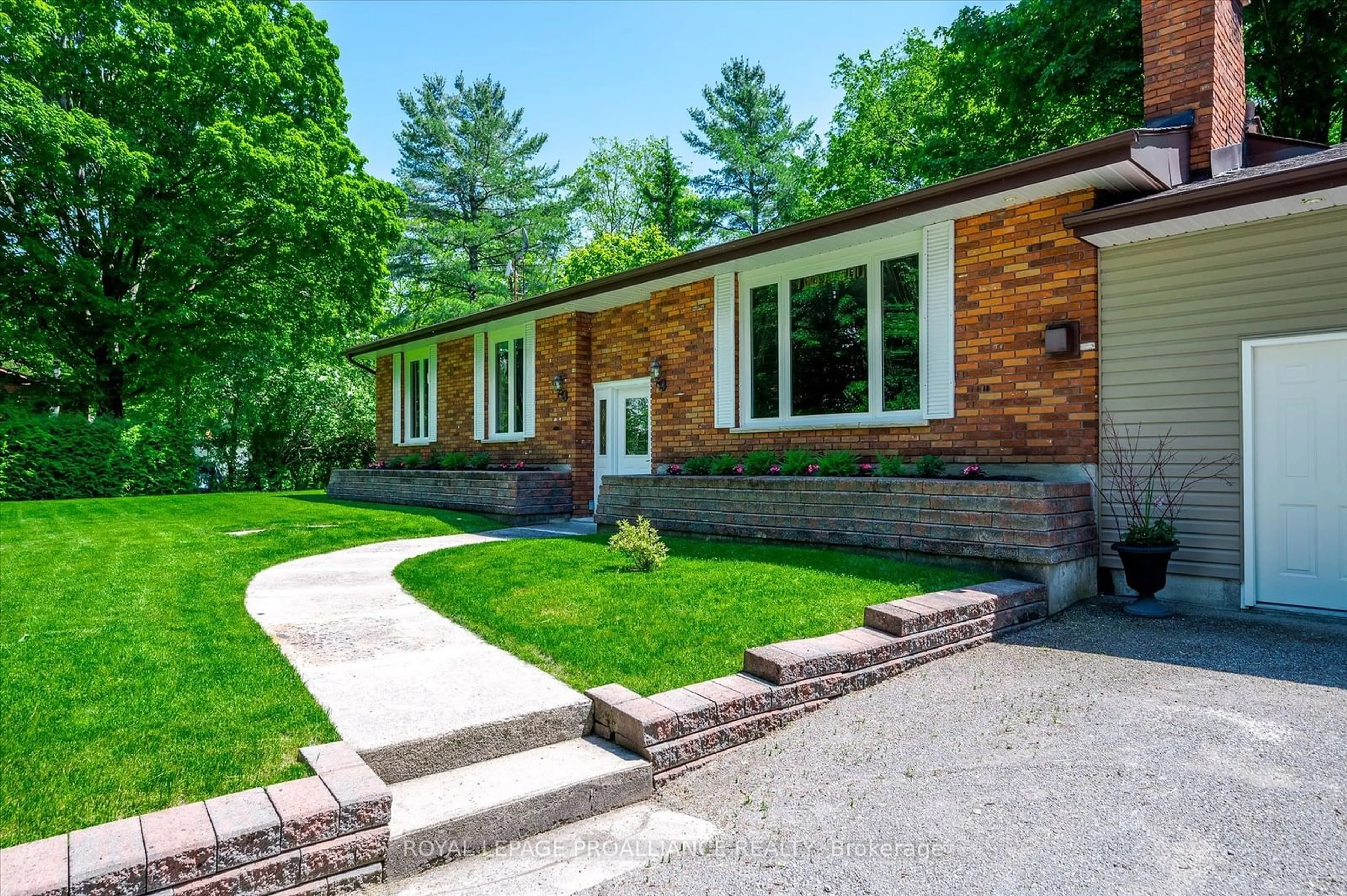 Home with brick exterior material for 1879 10th Line, Smith-Ennismore-Lakefield Ontario K0L 2H0