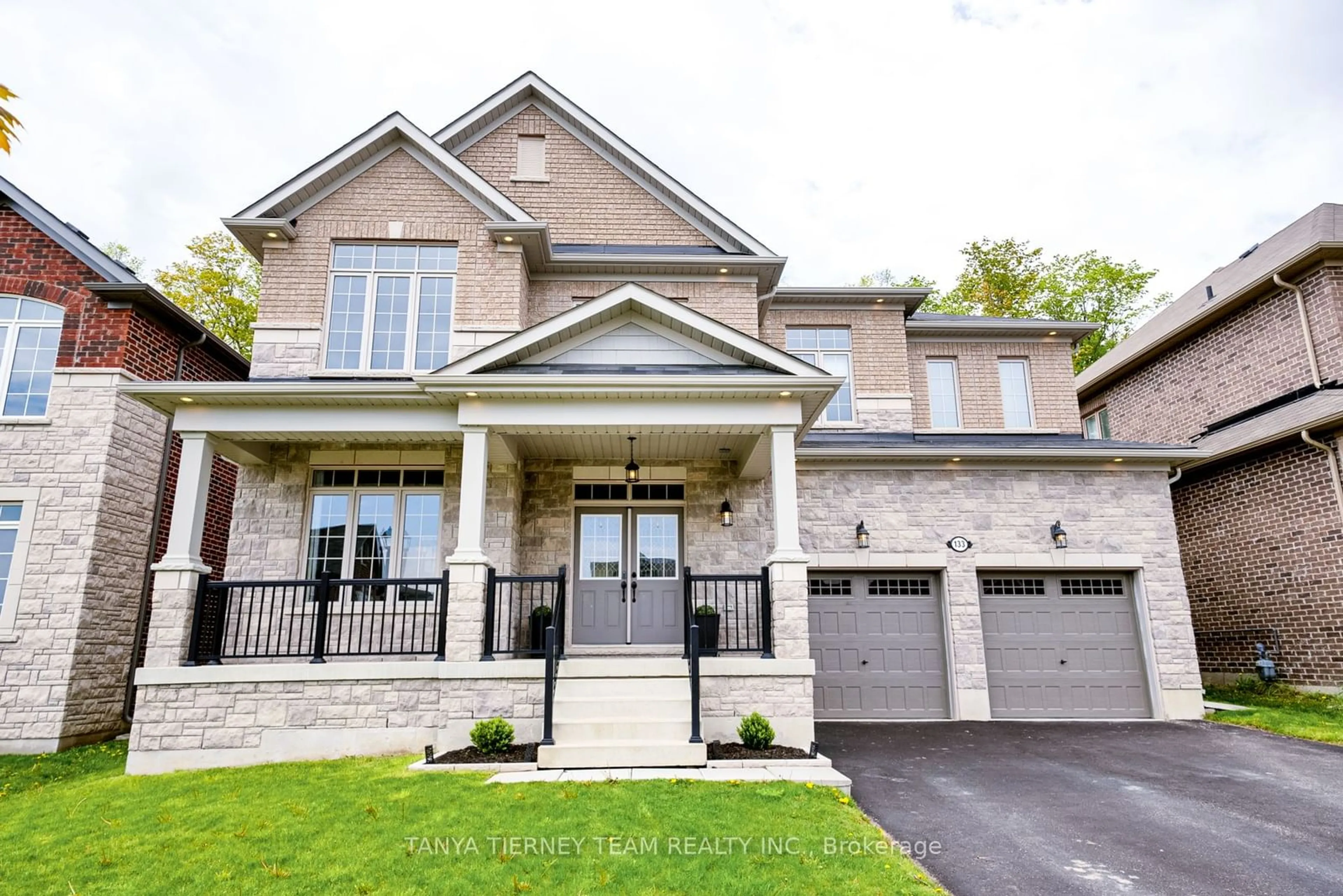 Home with brick exterior material for 133 Highlands Blvd, Cavan Monaghan Ontario L0A 1G0
