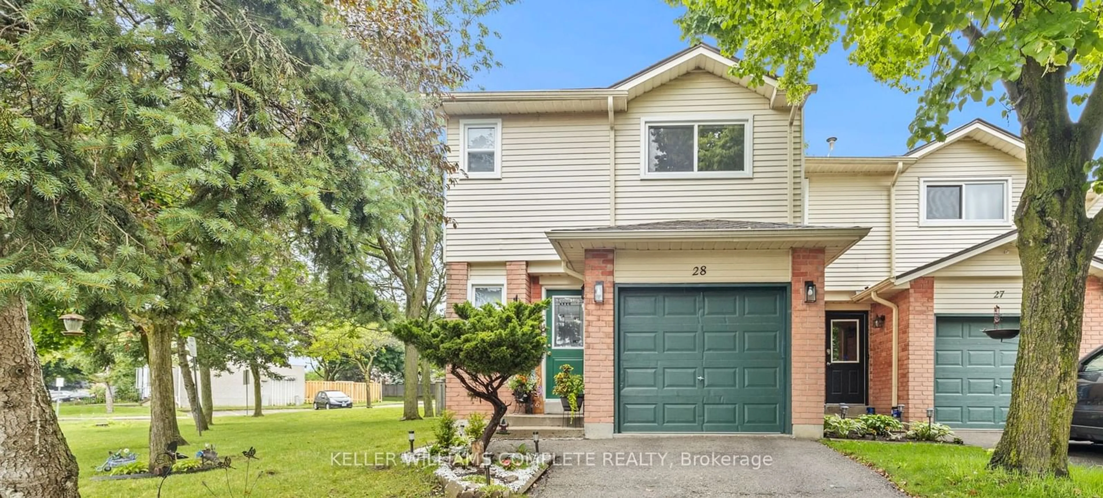 Frontside or backside of a home for 14 Derby St #28, Hamilton Ontario L8W 3T6