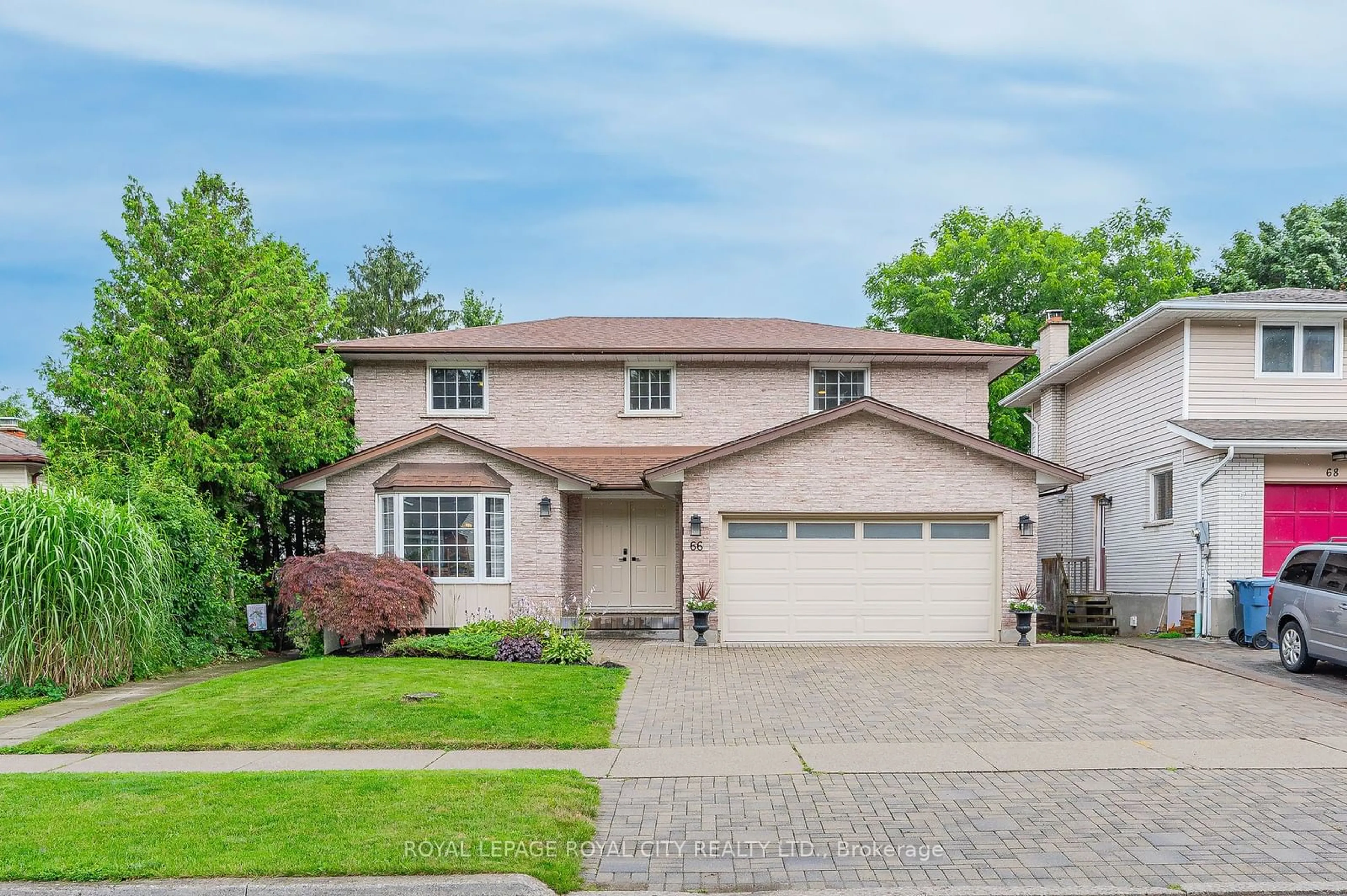 Frontside or backside of a home for 66 Sanderson Dr, Guelph Ontario N1H 7L9