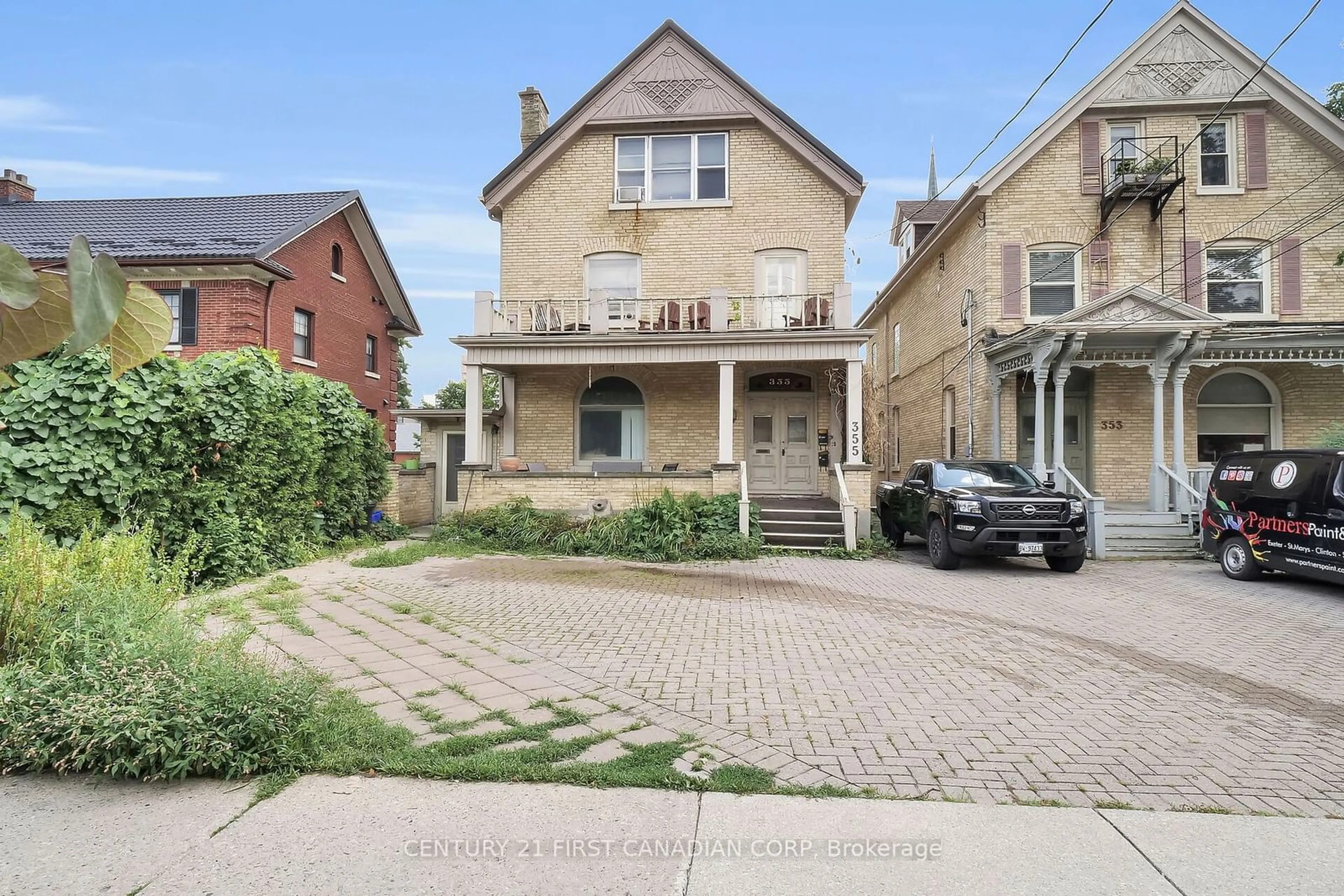 Frontside or backside of a home for 355 Dufferin Ave, London Ontario N6B 1Z5