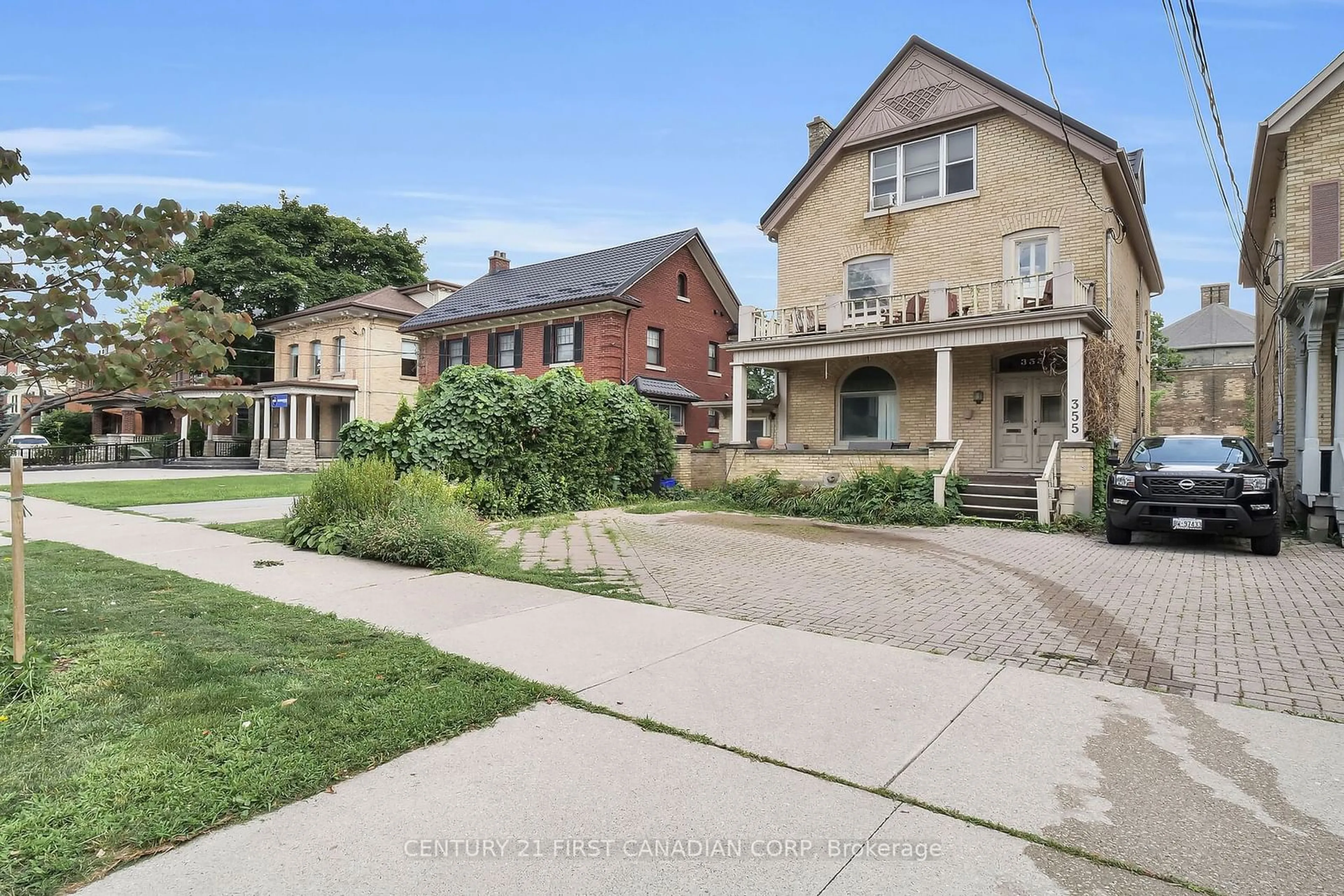 Frontside or backside of a home for 355 Dufferin Ave, London Ontario N6B 1Z5