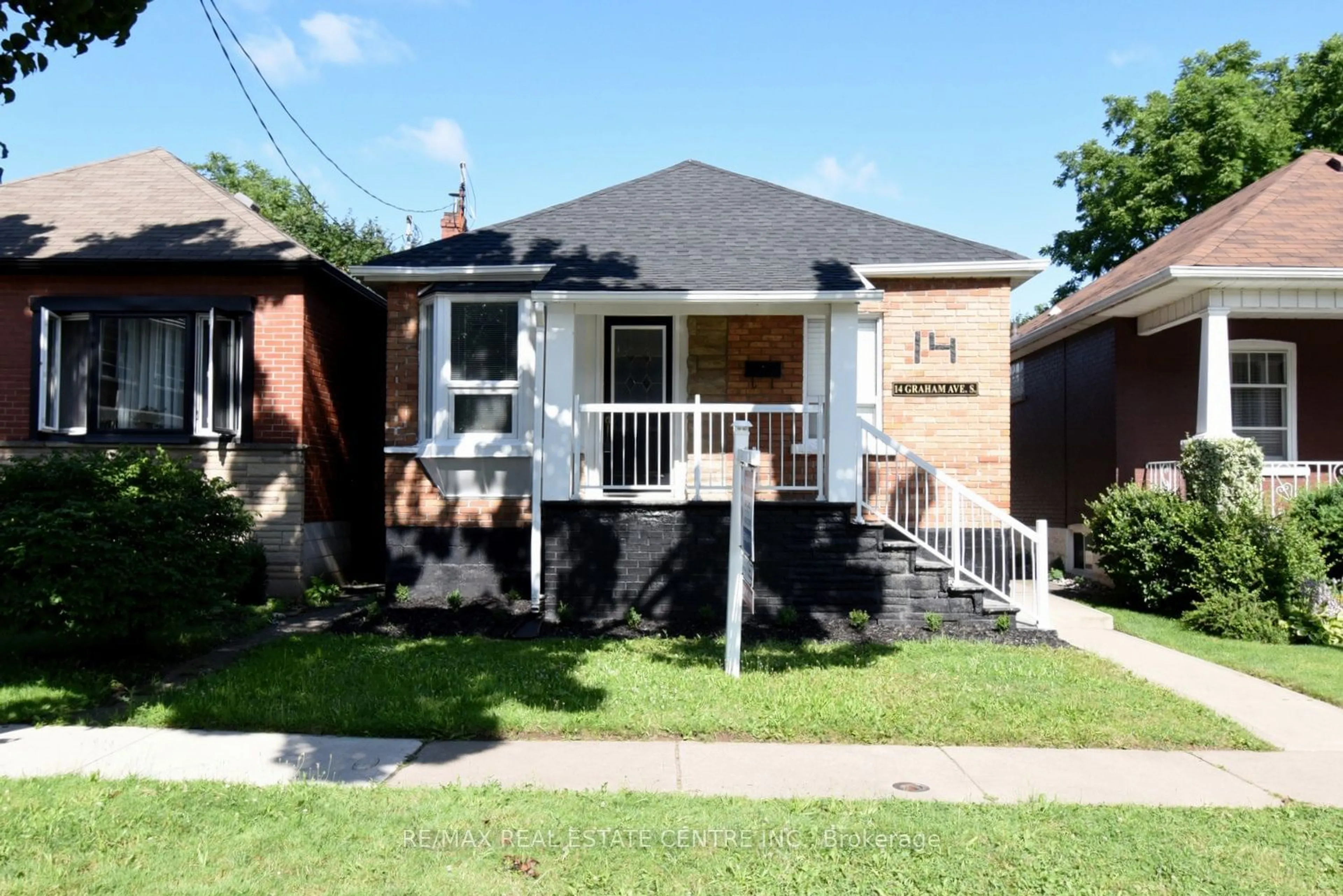 Frontside or backside of a home for 14 Graham Ave, Hamilton Ontario L8K 2L8