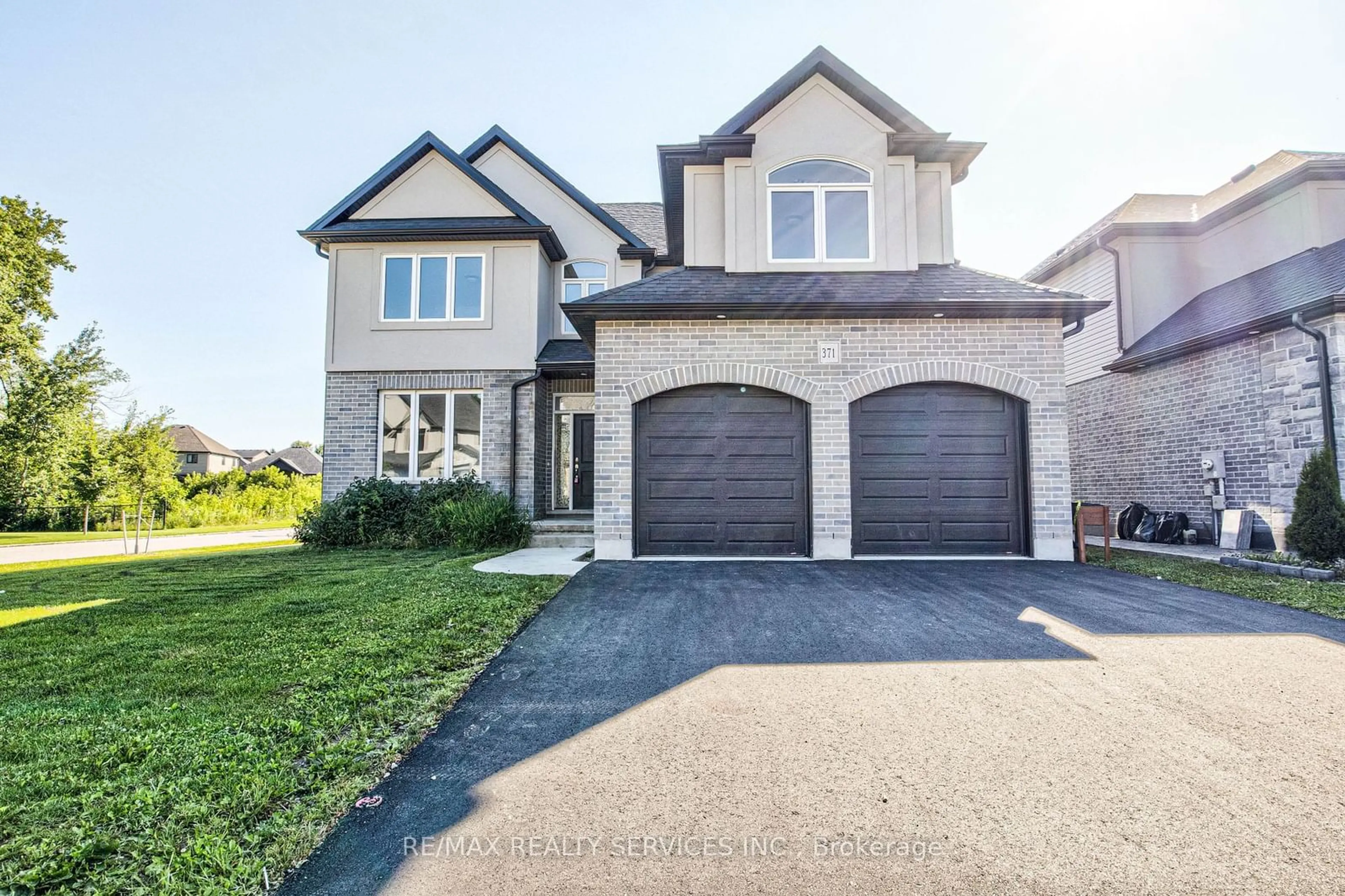 Frontside or backside of a home for 371 Masters Dr, Woodstock Ontario N4T 0L2