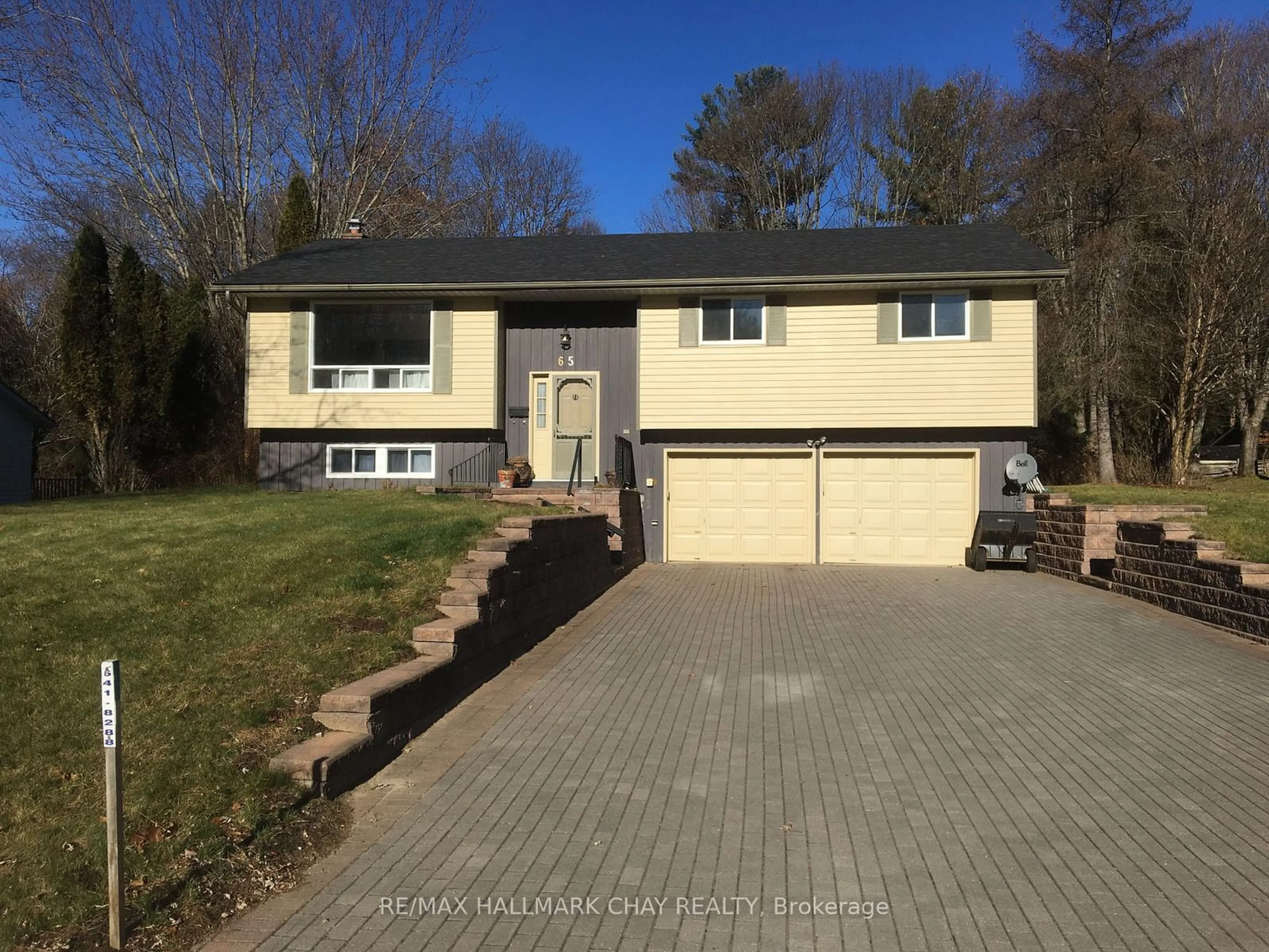 Frontside or backside of a home for 65 Meadow Heights Dr, Bracebridge Ontario P1L 1A3