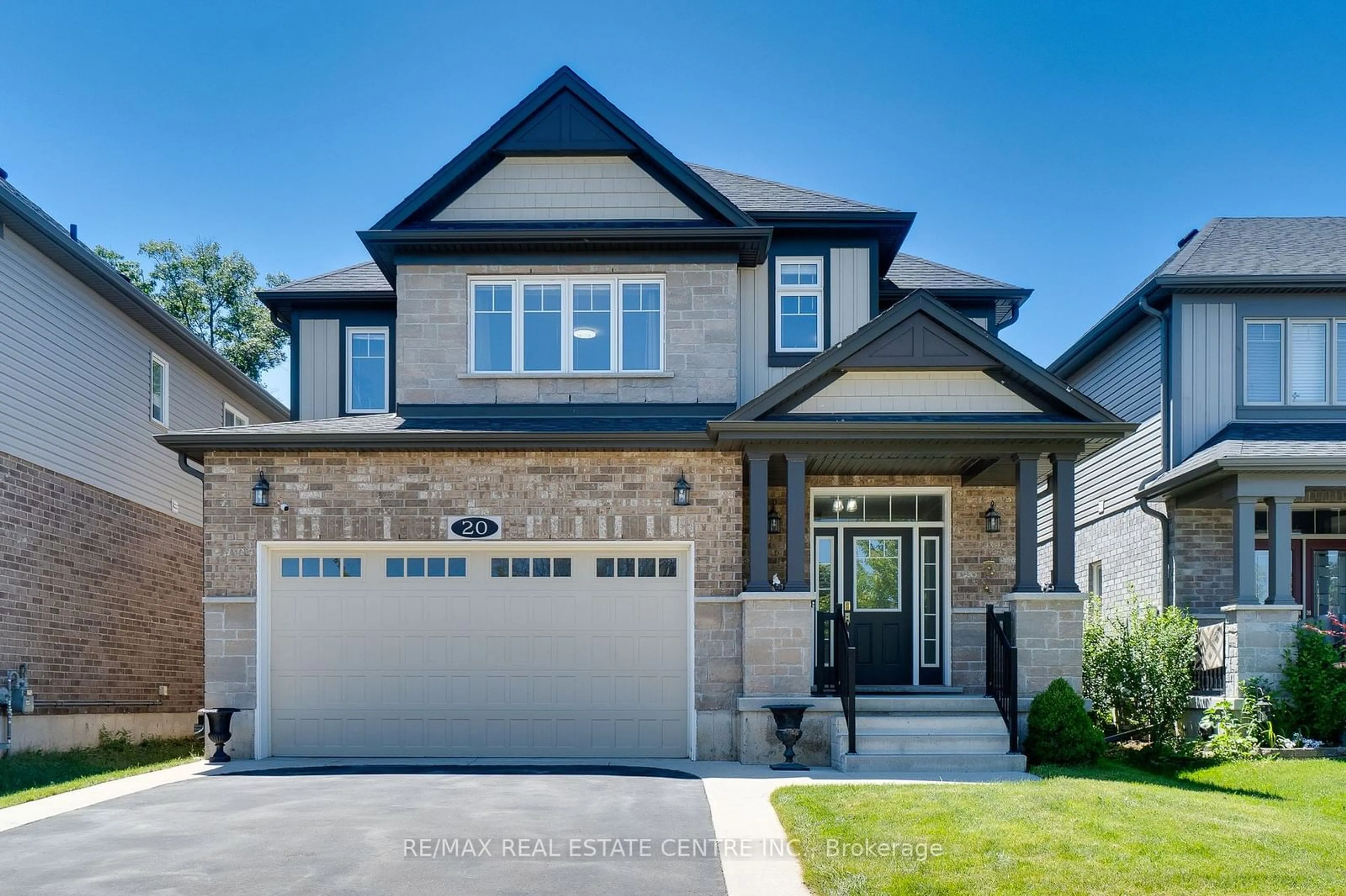 Home with brick exterior material for 20 Fraserwood Crt, Waterloo Ontario N1S 5B6