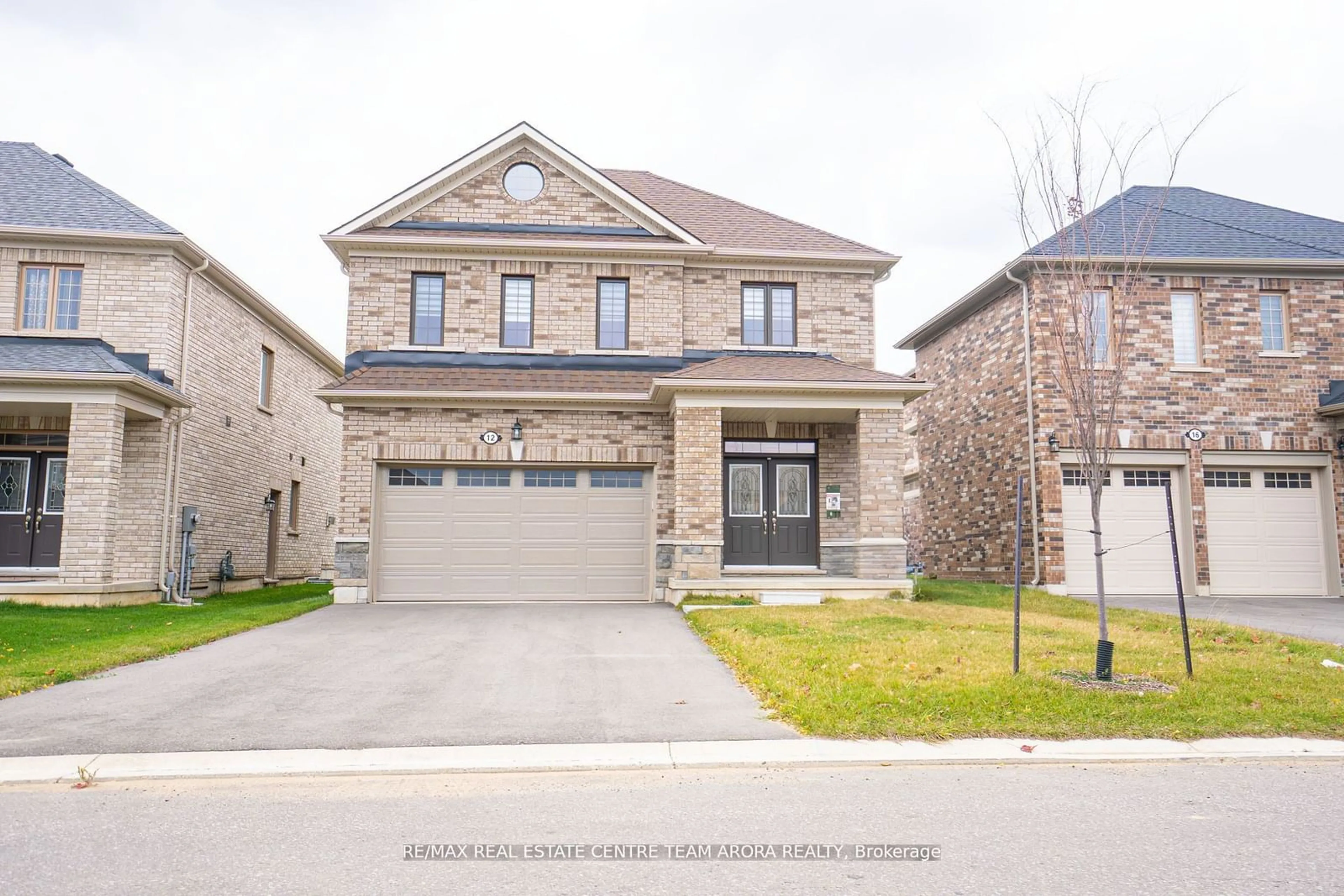 Home with brick exterior material for 12 Harwood St, Tillsonburg Ontario N4G 0J8