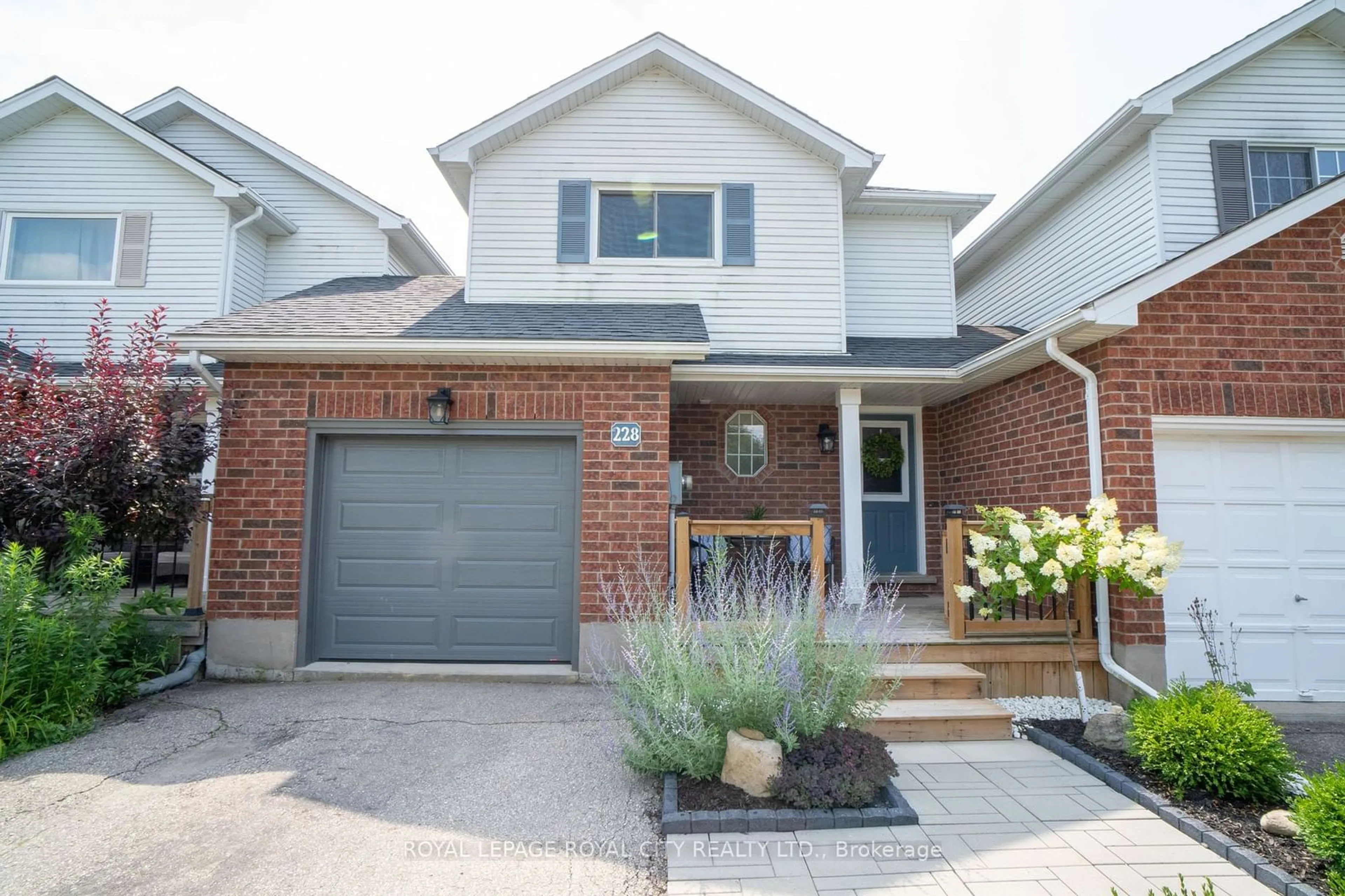 Home with brick exterior material for 228 Tait Cres, Centre Wellington Ontario N1M 3P6