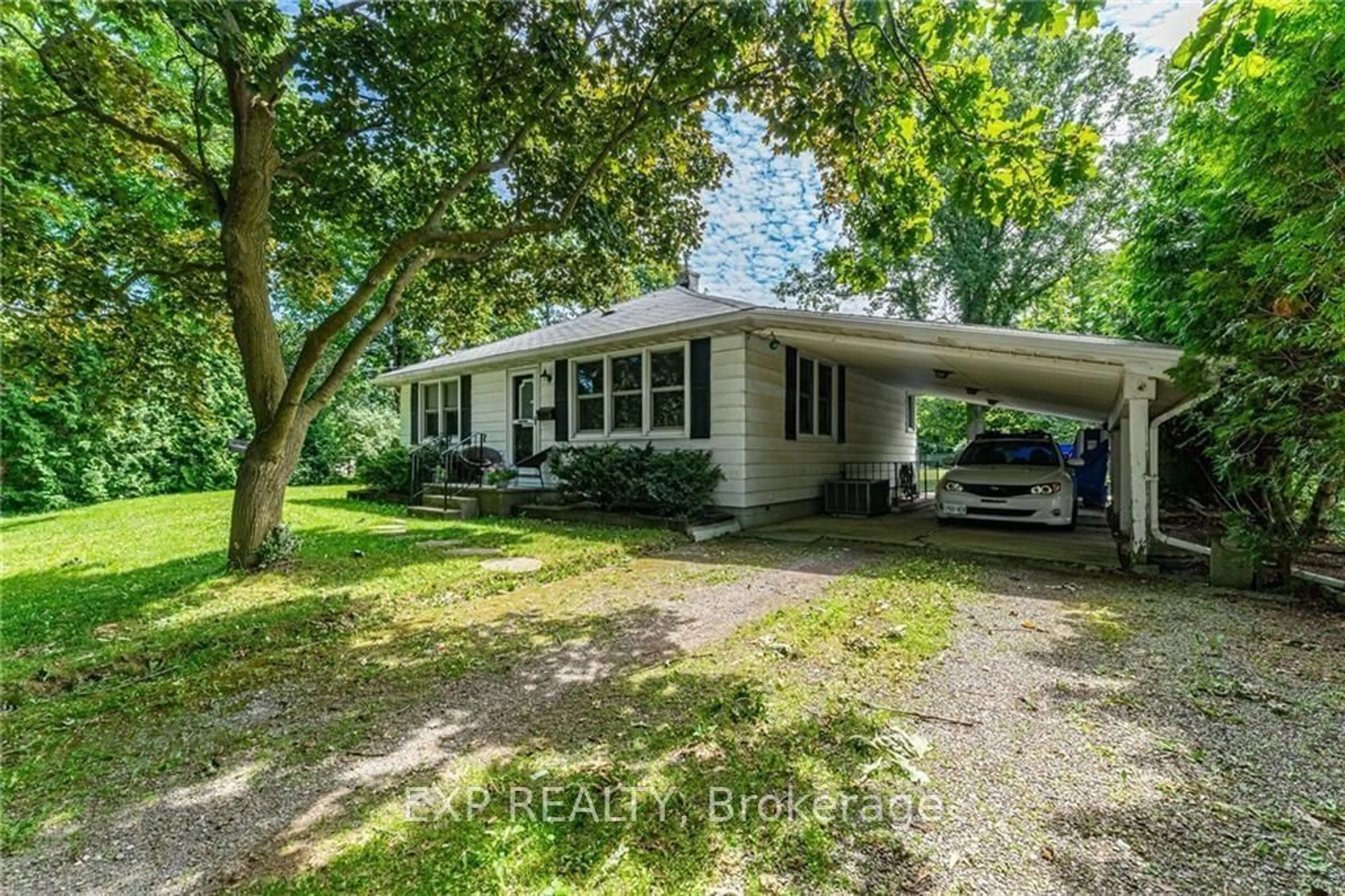 Frontside or backside of a home for 879 West 5th St, Hamilton Ontario L9C 5R4