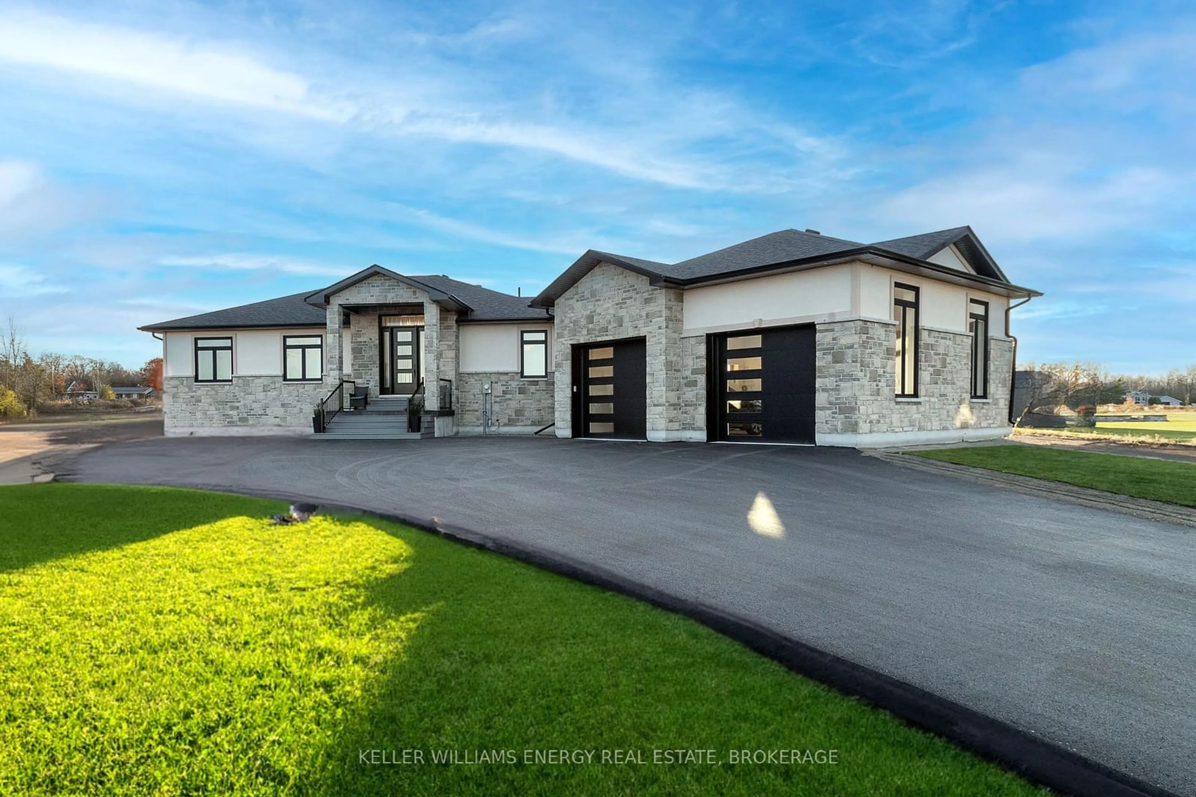 Frontside or backside of a home for 76 Navigation Dr, Prince Edward County Ontario K8N 0G1