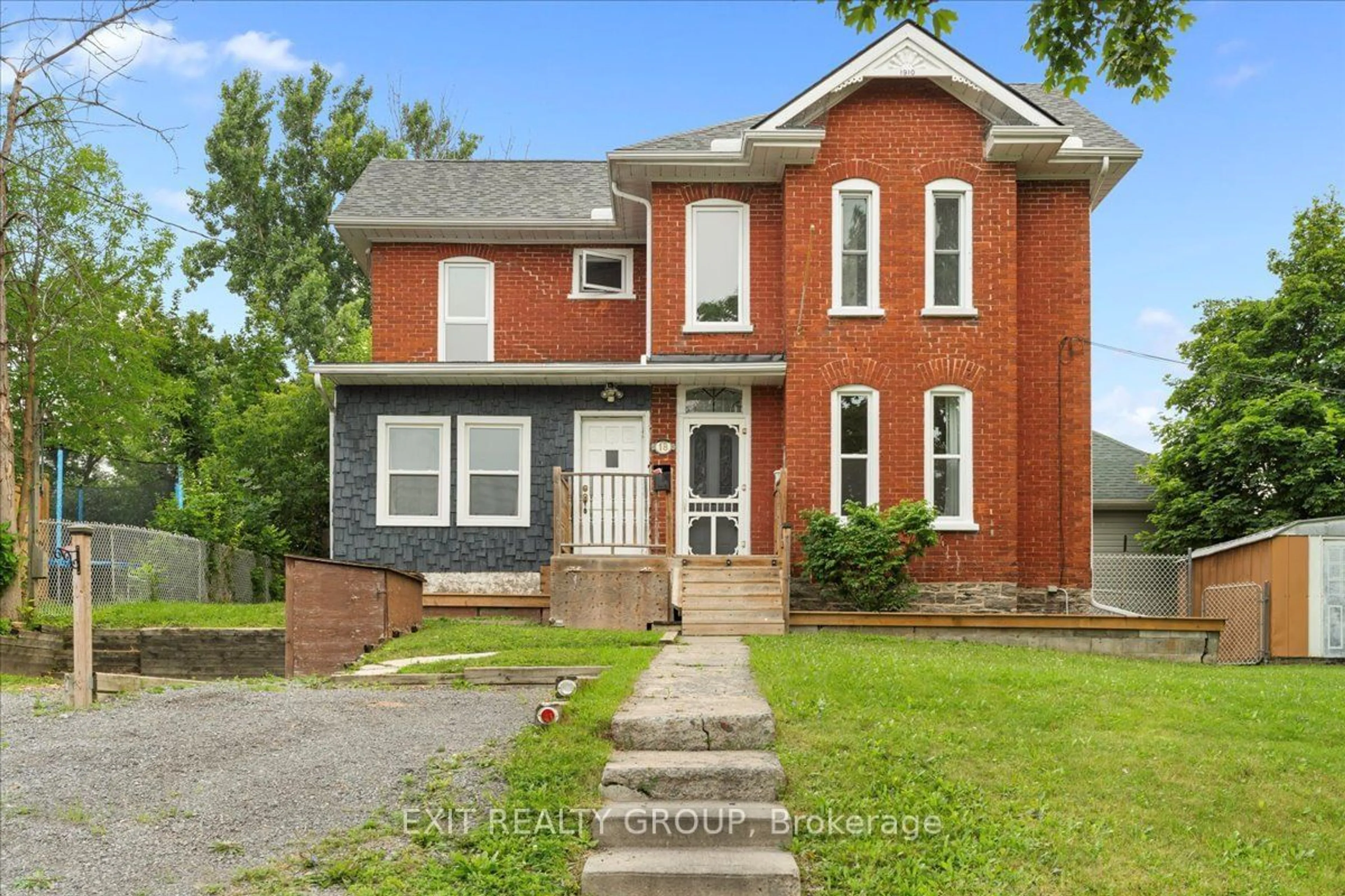 Home with brick exterior material for 18 Stone St, Belleville Ontario K8P 1Z9