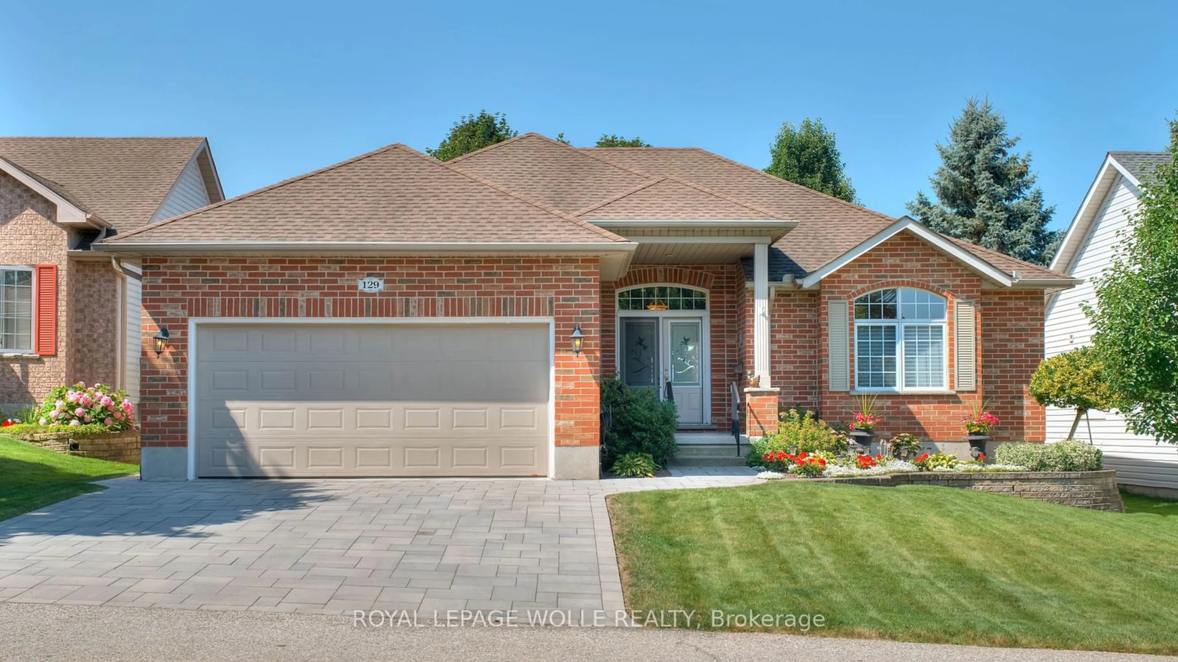 Home with brick exterior material for 129 Golf Links Dr #28, Wilmot Ontario N3A 3N7