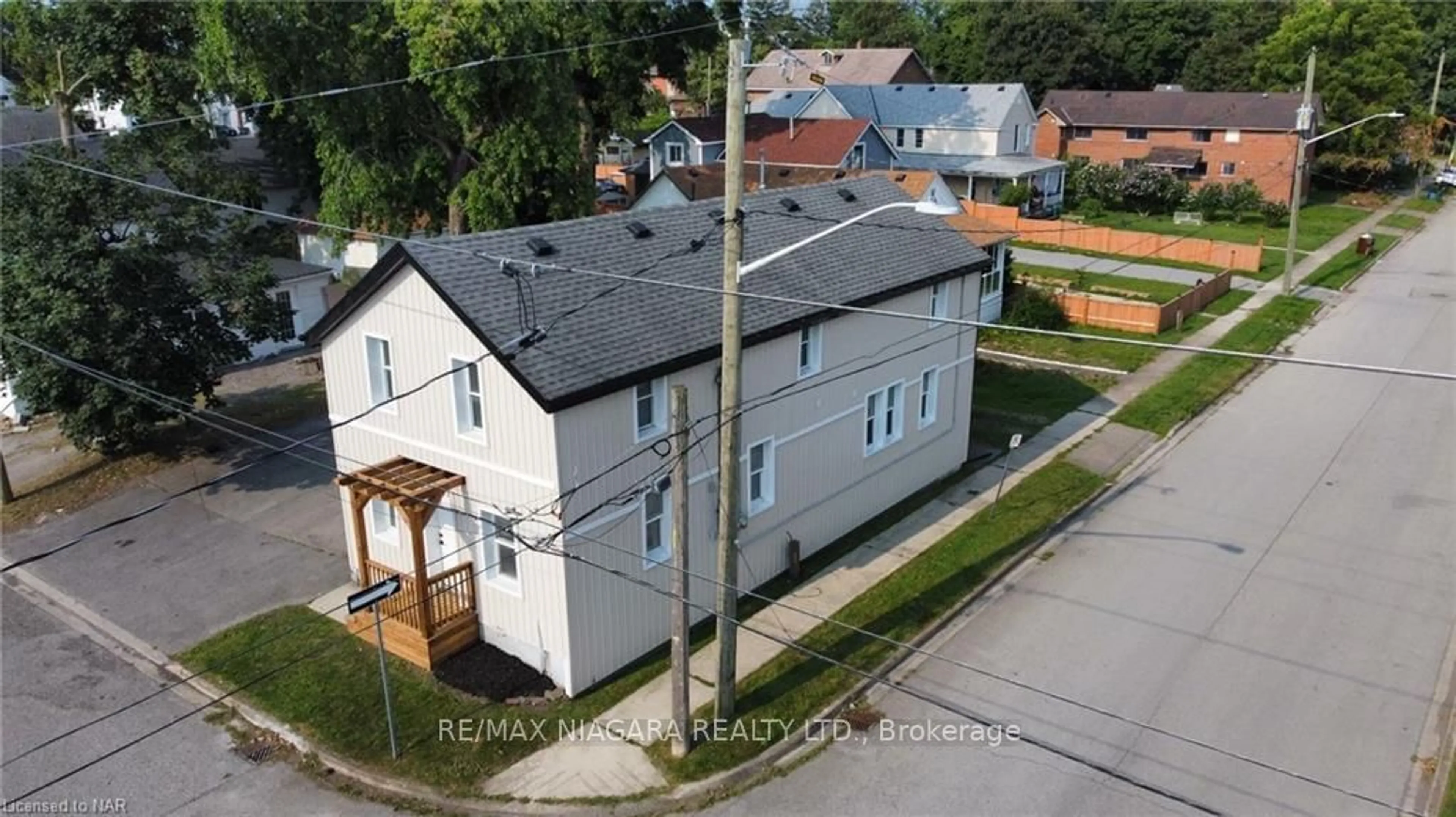 Frontside or backside of a home, the fenced backyard for 132 Waterloo St, Fort Erie Ontario L2A 3K2