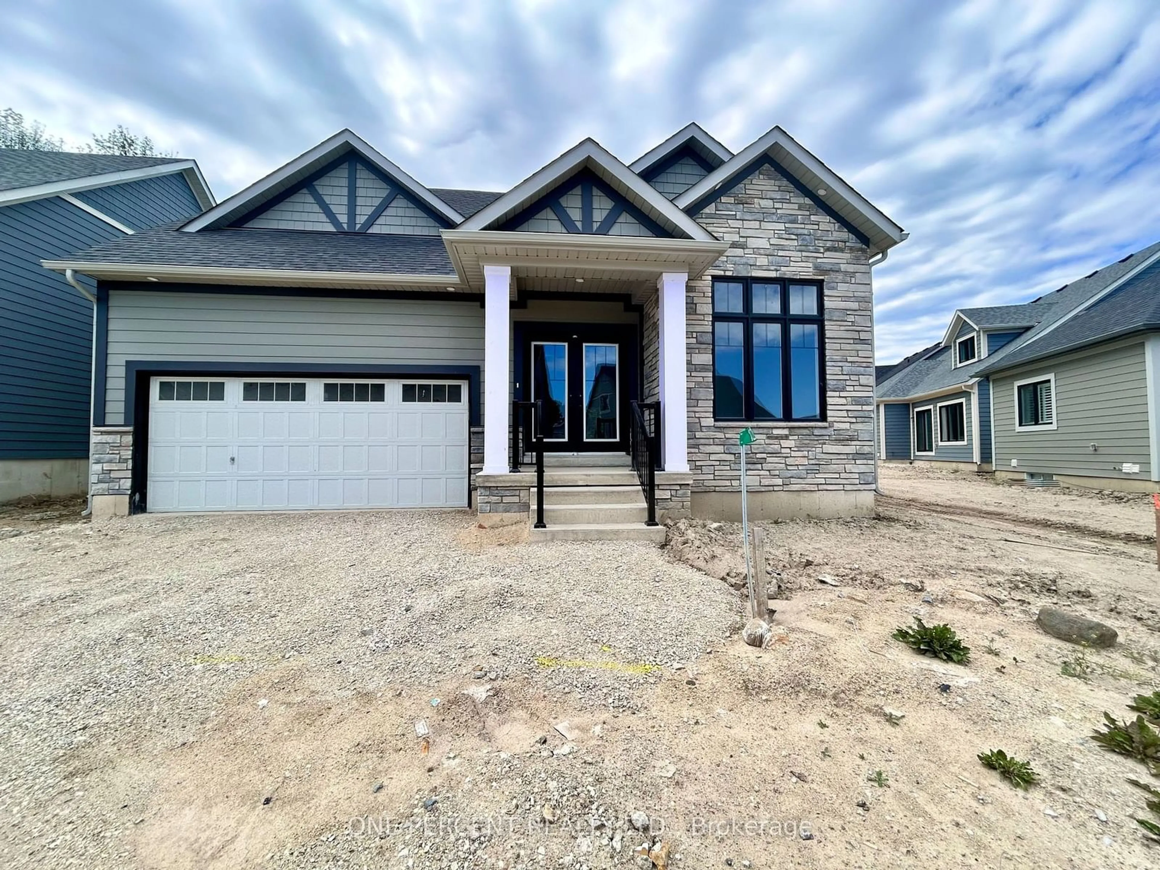 Frontside or backside of a home, the street view for 122 Beacon Dr, Blue Mountains Ontario N0H 2P0