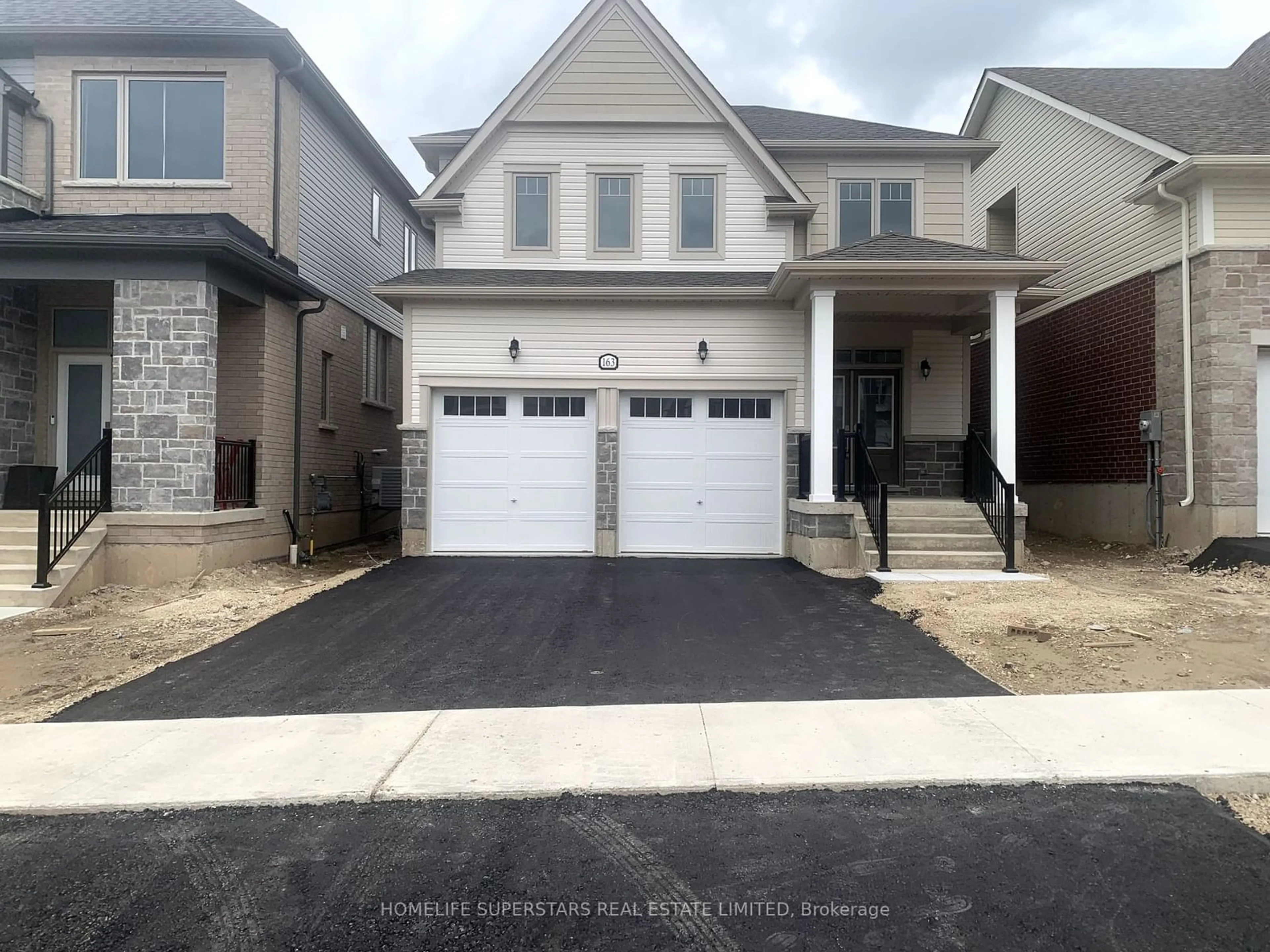 Frontside or backside of a home for 163 Povey Rd, Centre Wellington Ontario N1M 0J6