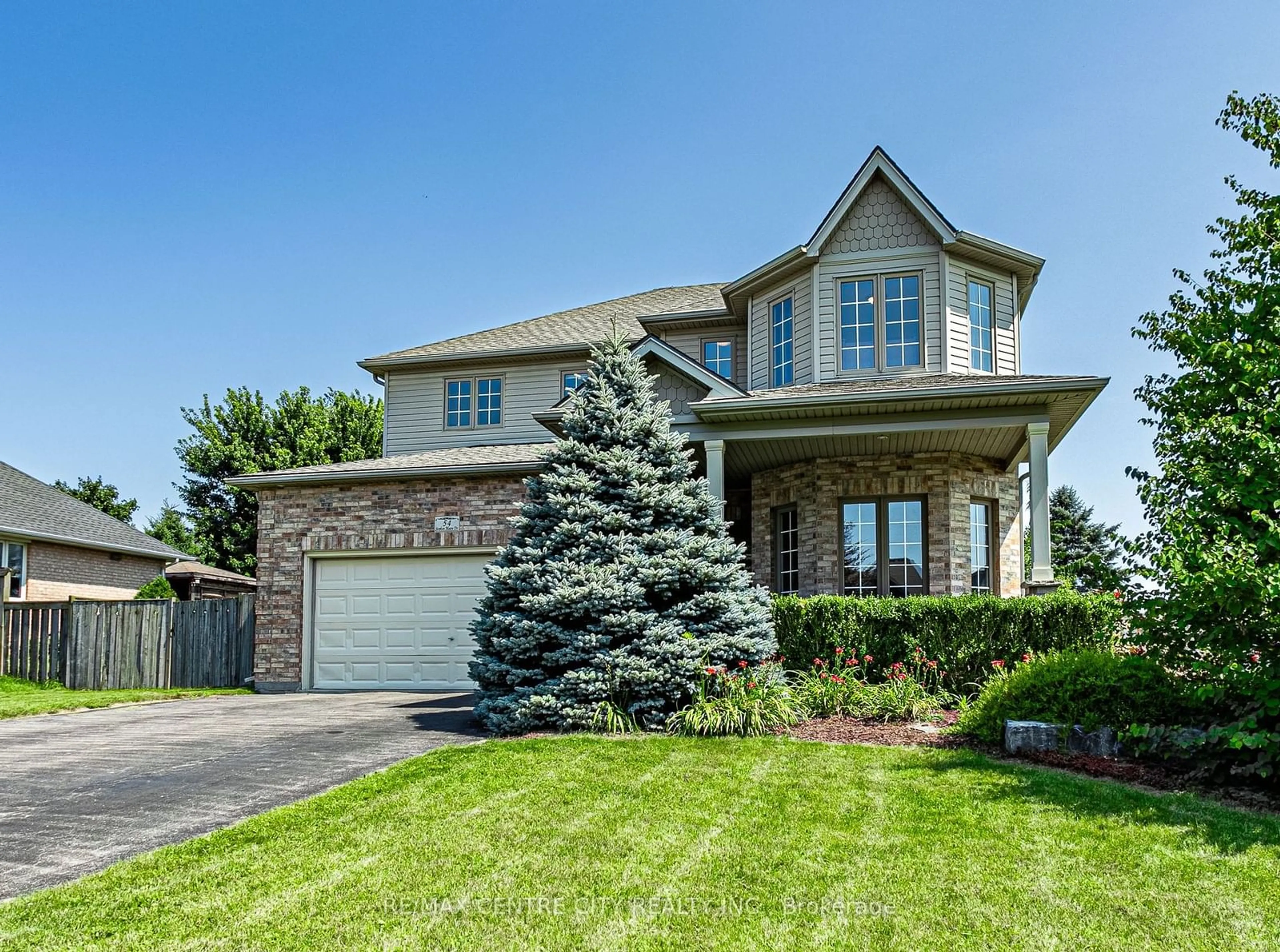 Frontside or backside of a home for 54 Stephen Moore Dr, Middlesex Centre Ontario N0L 1R0