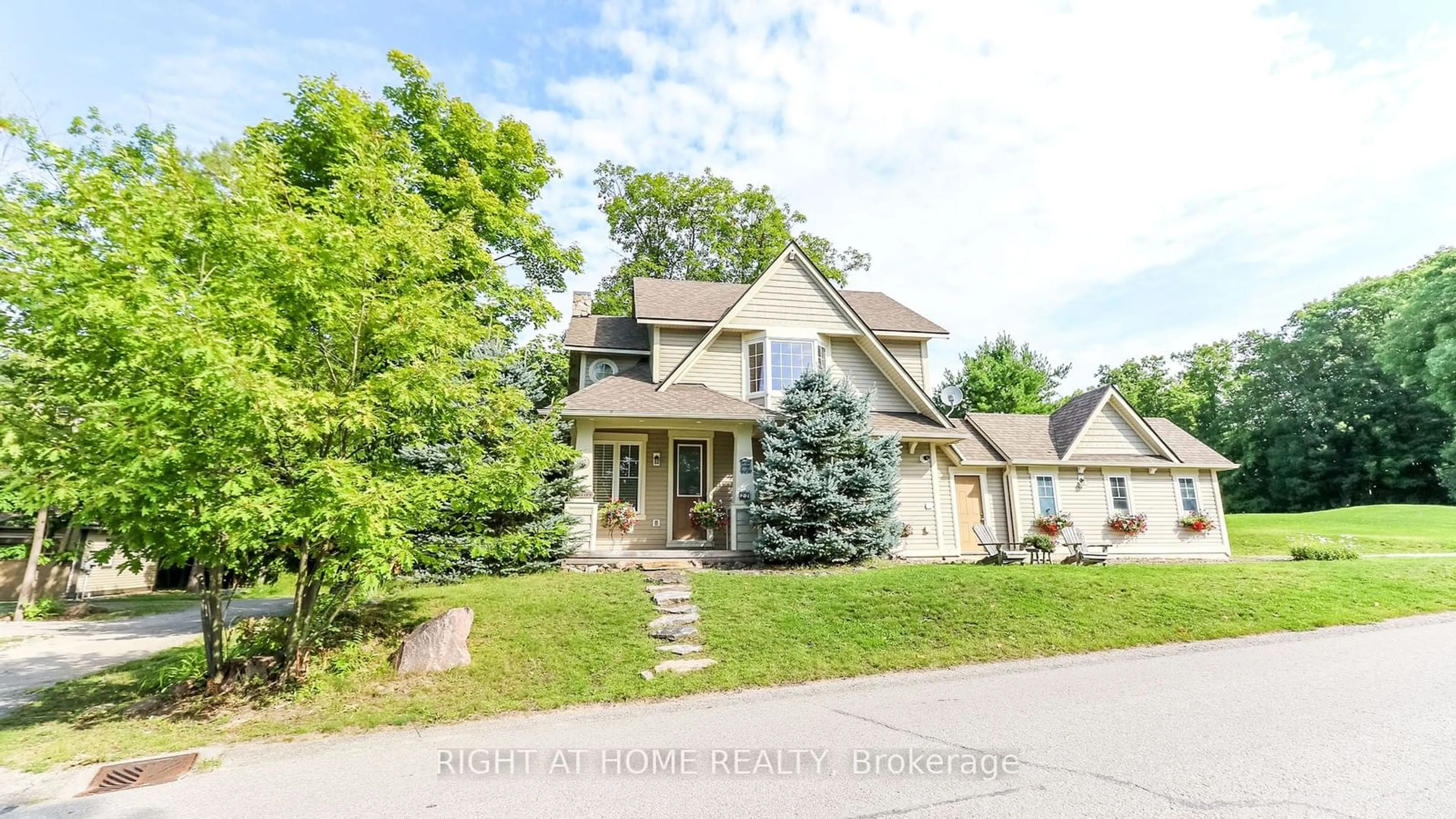 Frontside or backside of a home, the street view for 22 Marina Village Dr, Georgian Bay Ontario L0K 1S0