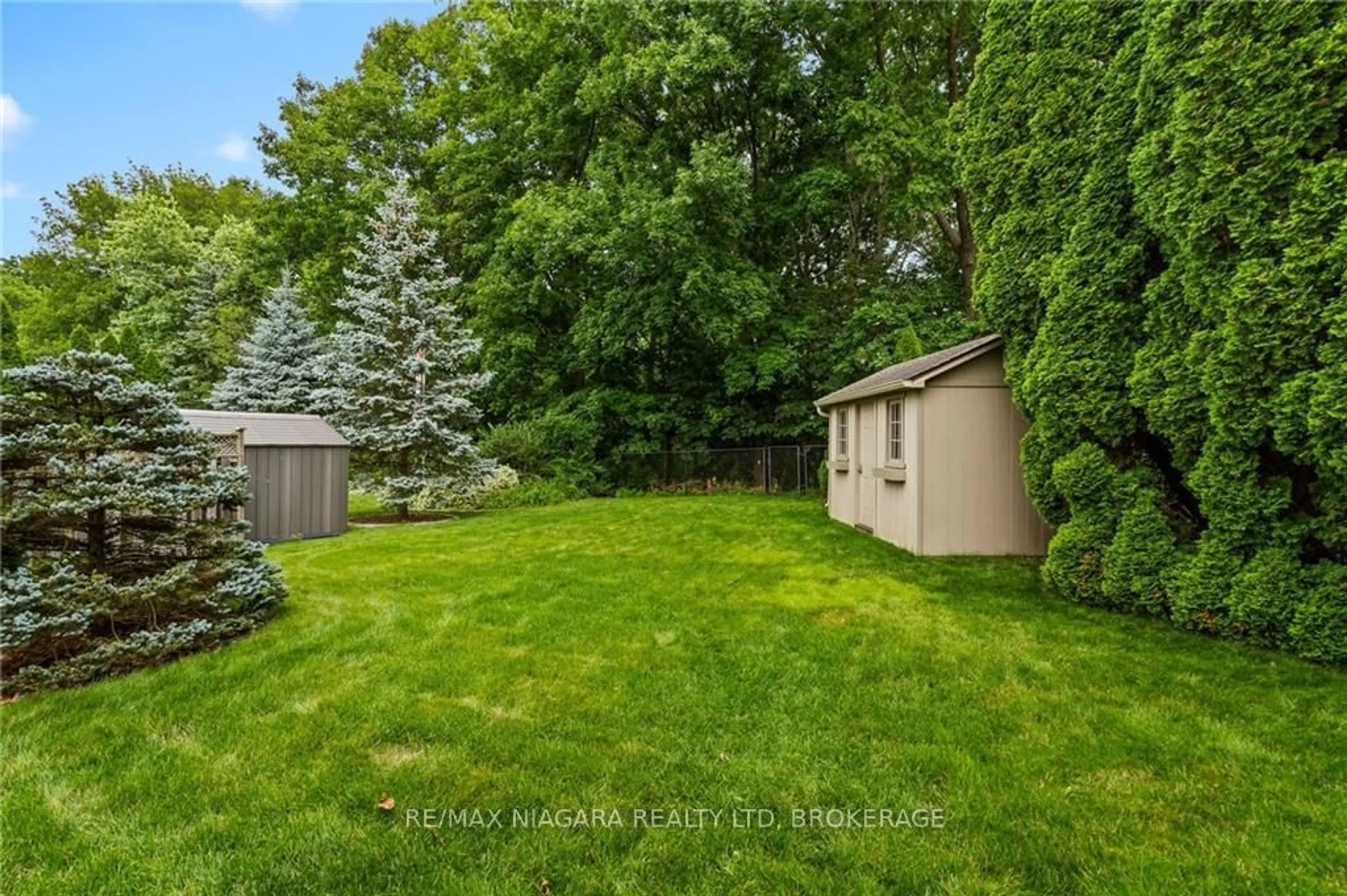 A pic from exterior of the house or condo, the fenced backyard for 6 Butler Cres, St. Catharines Ontario L2M 7B3