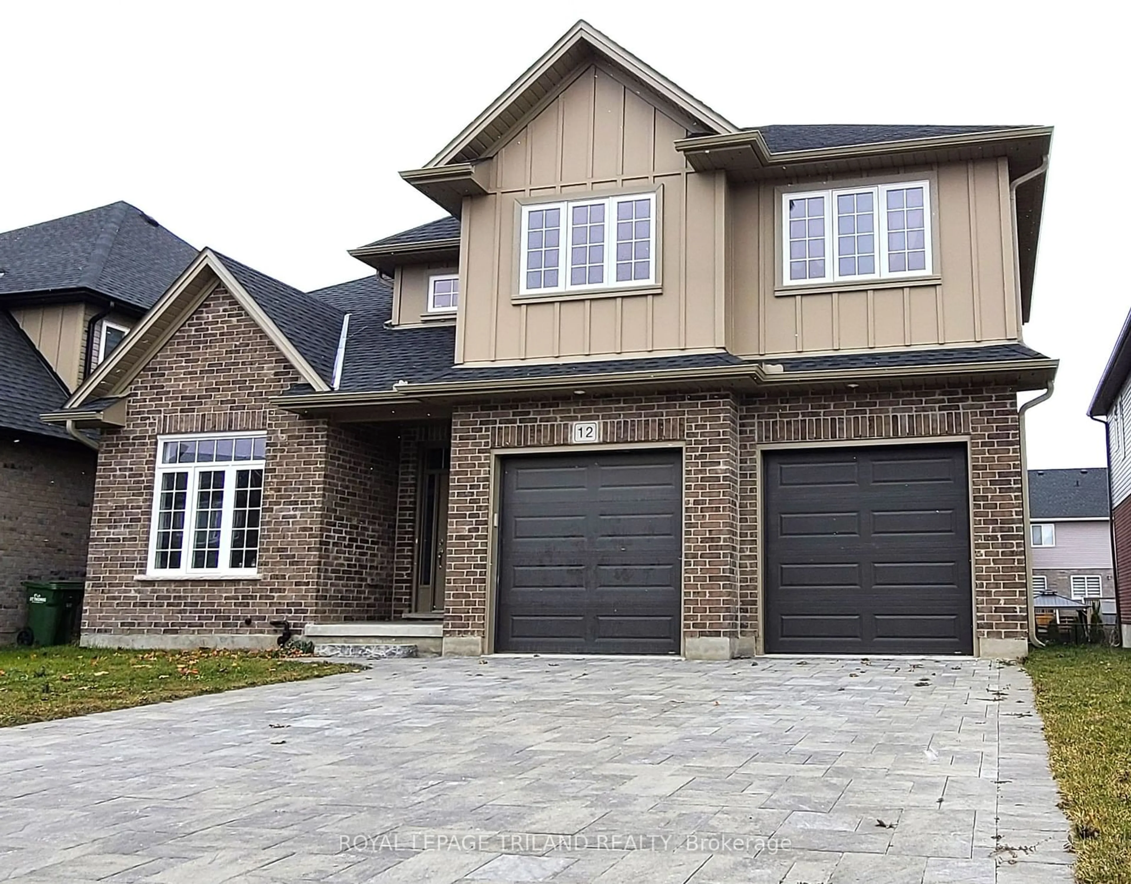 Home with brick exterior material for 12 Honey Bend, St. Thomas Ontario N5R 0H6