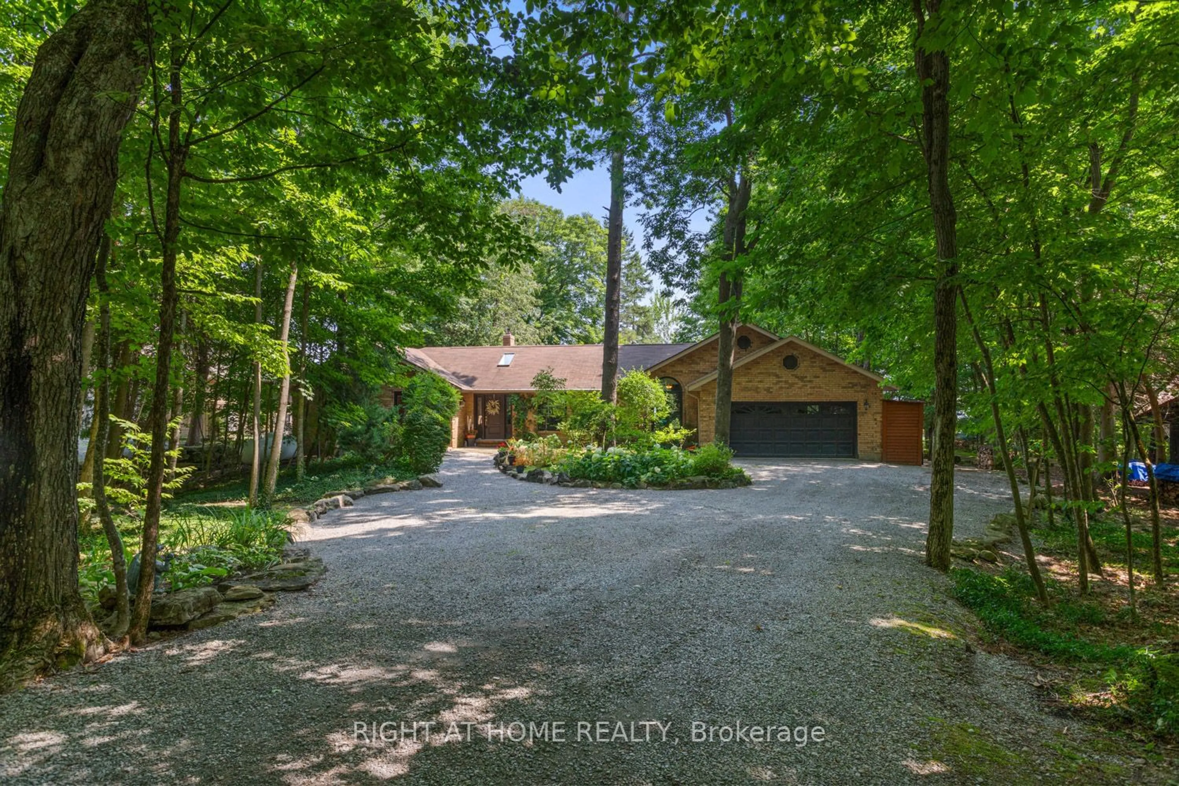 Frontside or backside of a home for 60 Mcgregor Dr, Kawartha Lakes Ontario K0M 1A0