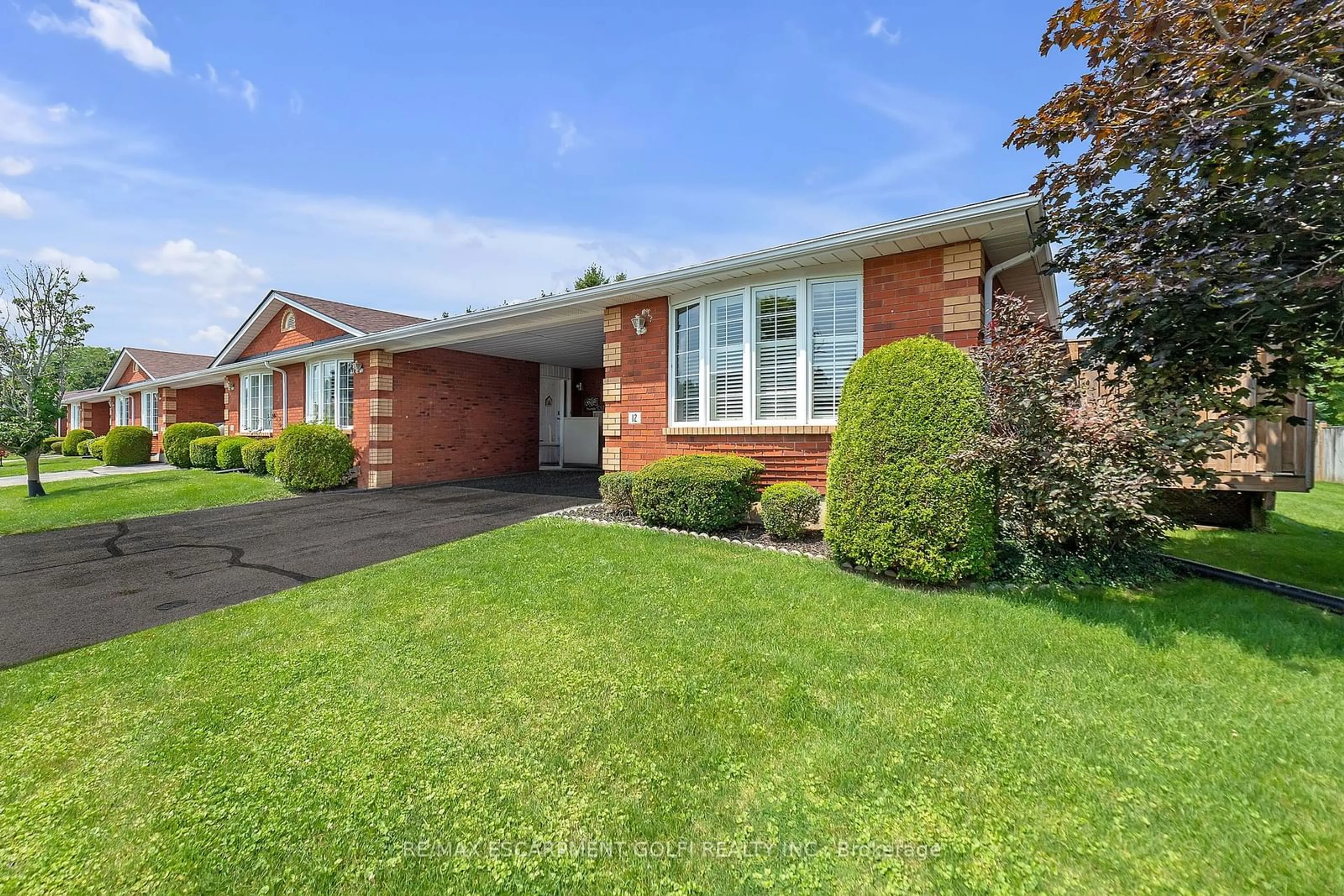 Home with brick exterior material for 20 Courtland Dr #12, Brantford Ontario N3R 7Y2