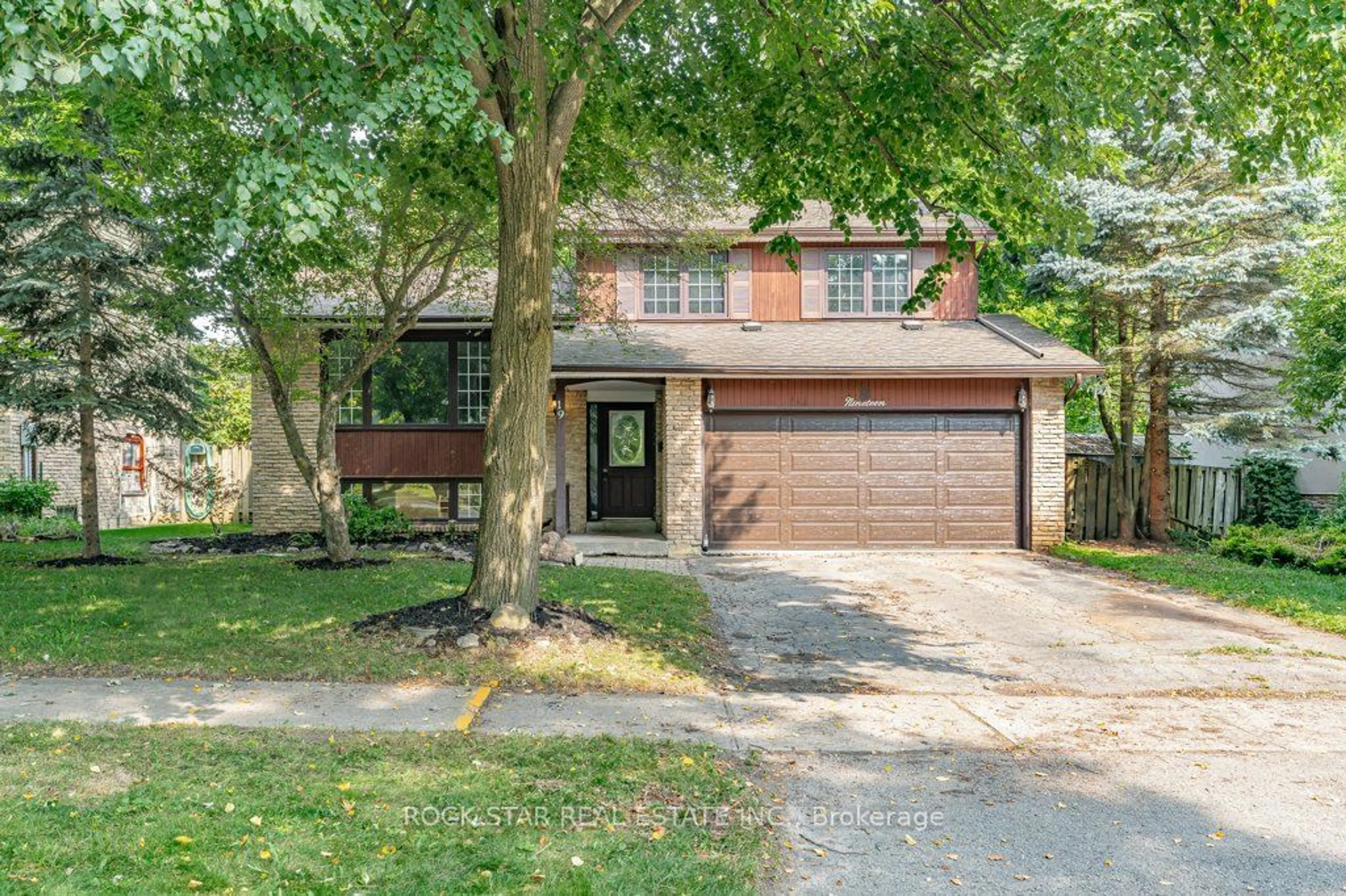 Home with brick exterior material for 19 NORTHWOOD Cres, Guelph Ontario N1H 6Z5