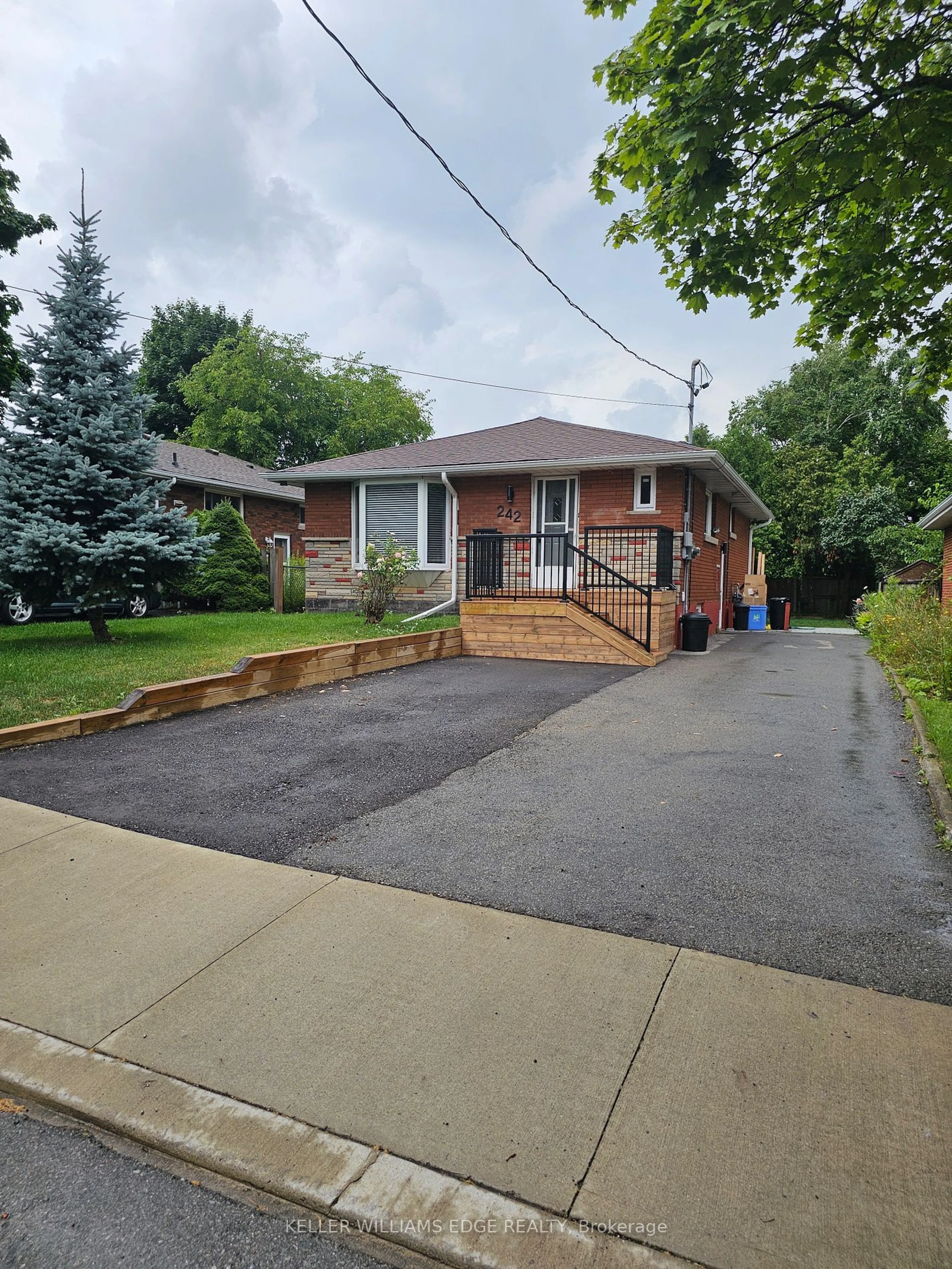 Frontside or backside of a home, the street view for 242 West 18th St, Hamilton Ontario L9C 4G9