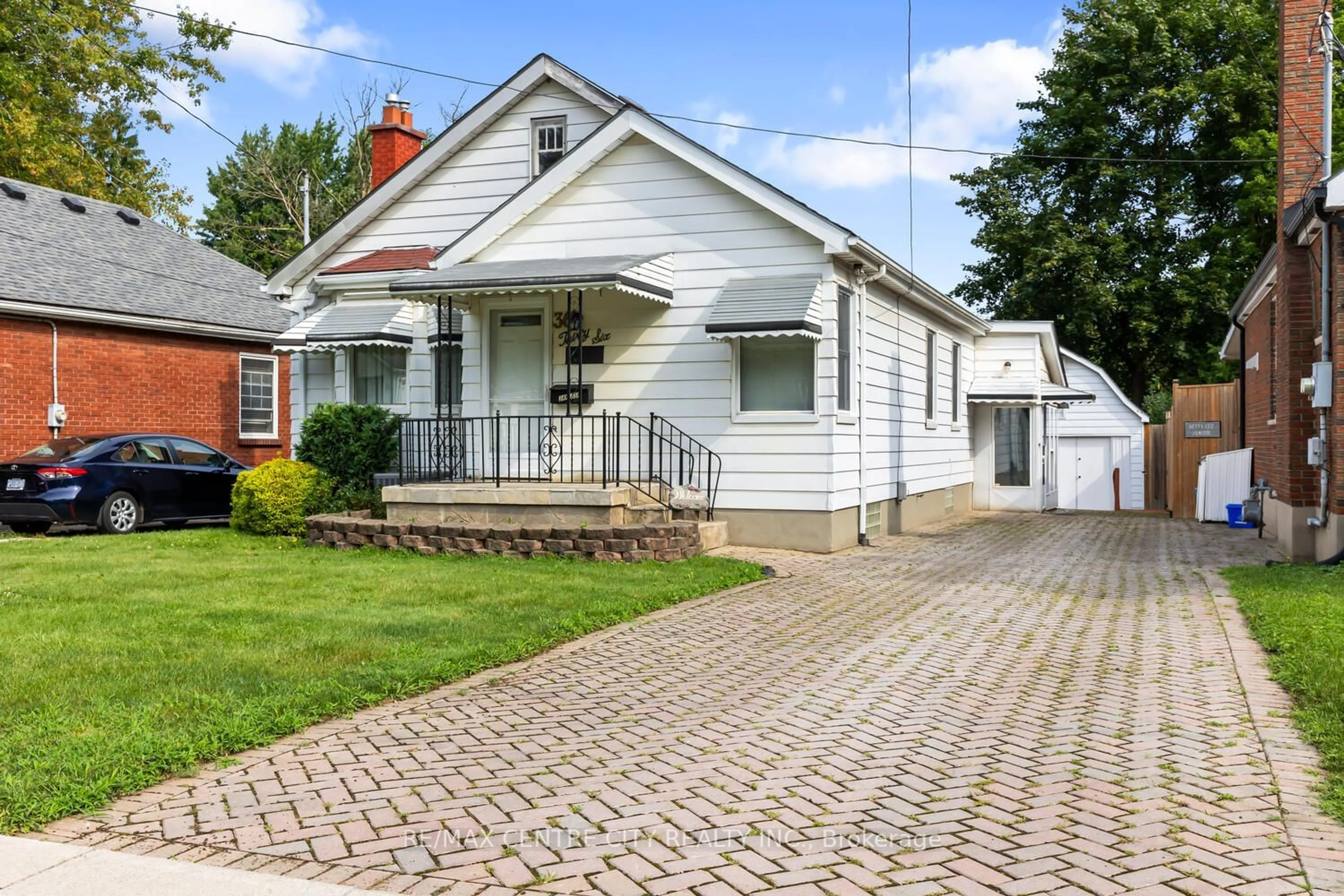 Frontside or backside of a home for 36 Briscoe St, London Ontario N6C 1W9