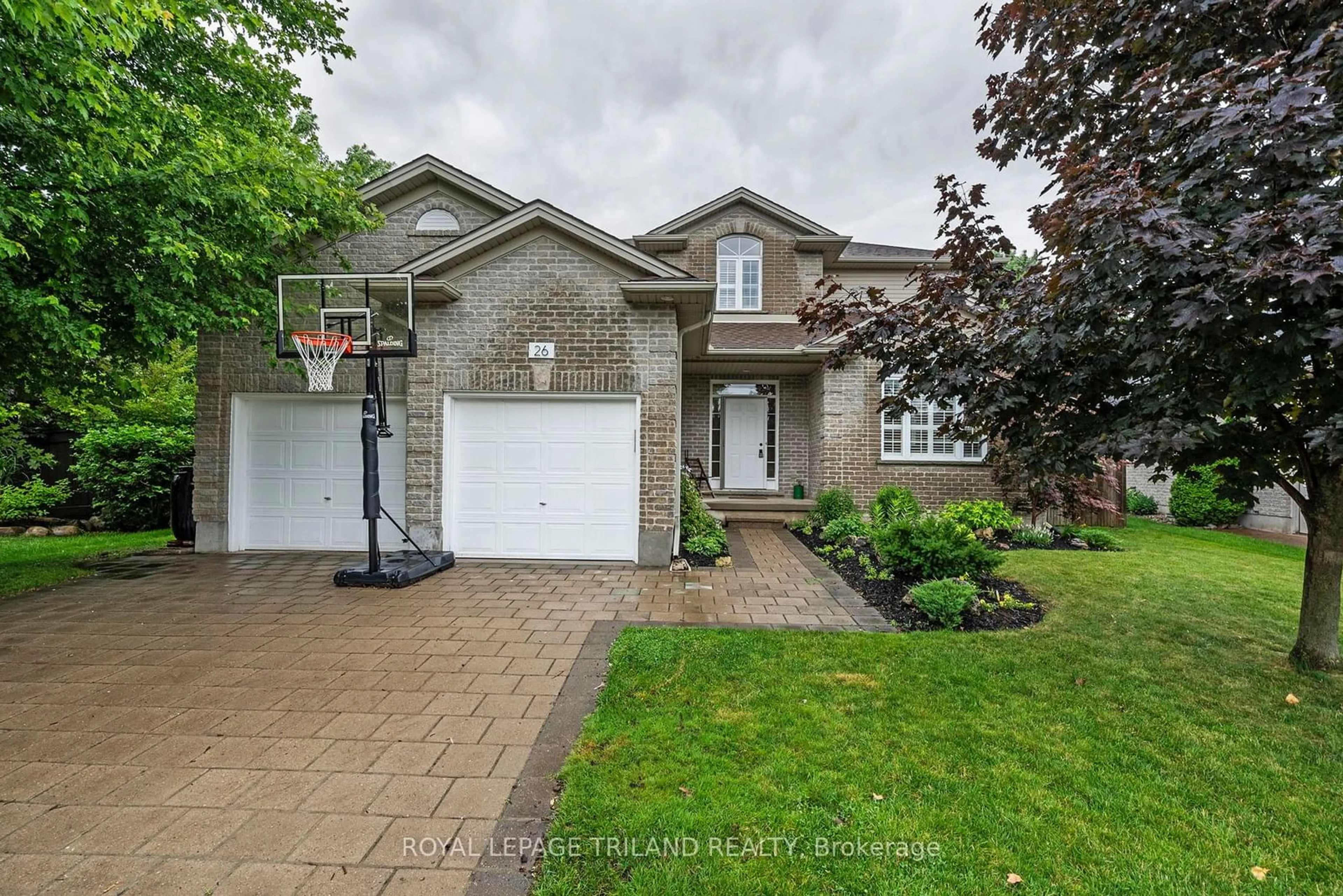 Frontside or backside of a home for 26 Blue Heron Dr, Middlesex Centre Ontario N0M 2J0